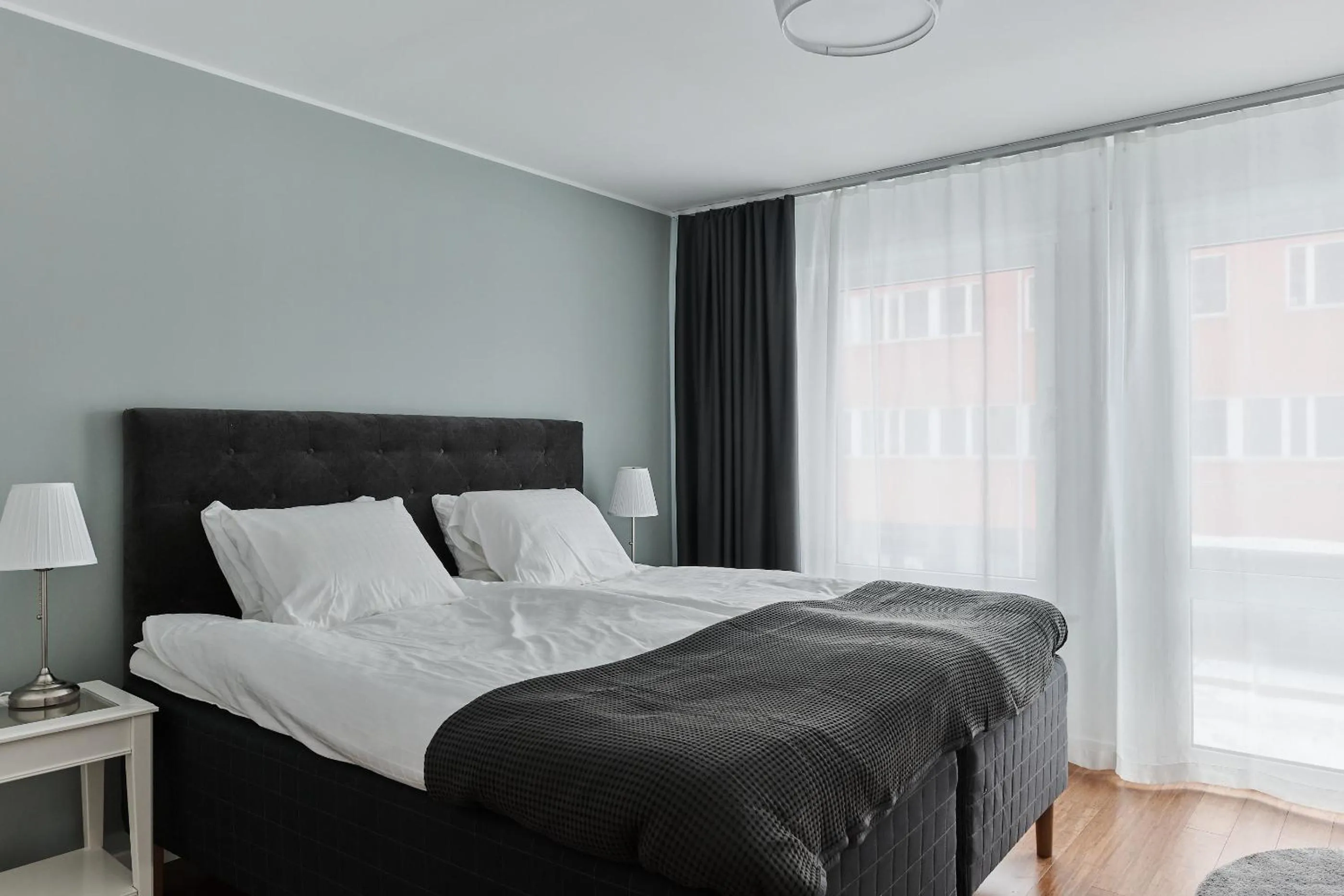 Property building, Bed in Continental Apartment Hotel Knivsta
