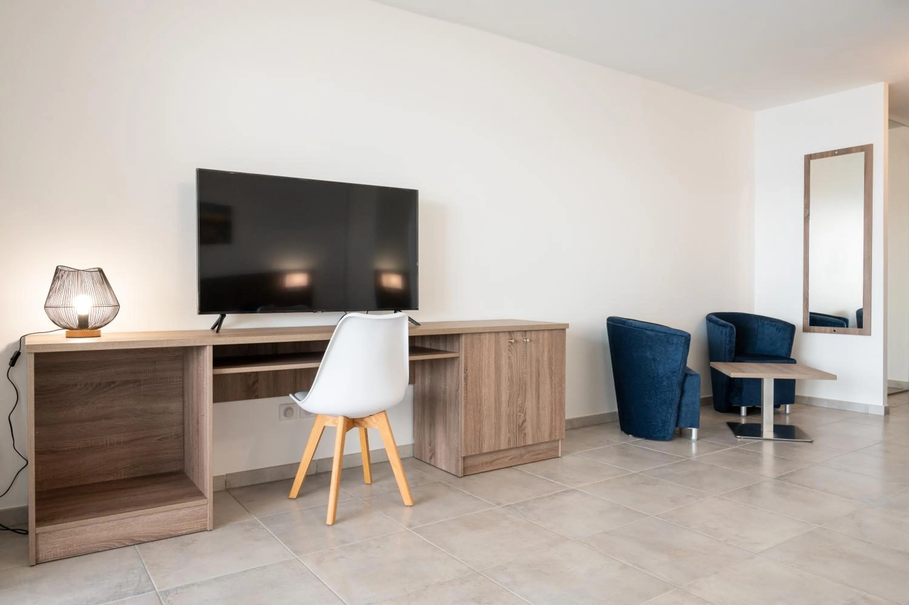 TV and multimedia in B&B HOME Fort-de-France Marina