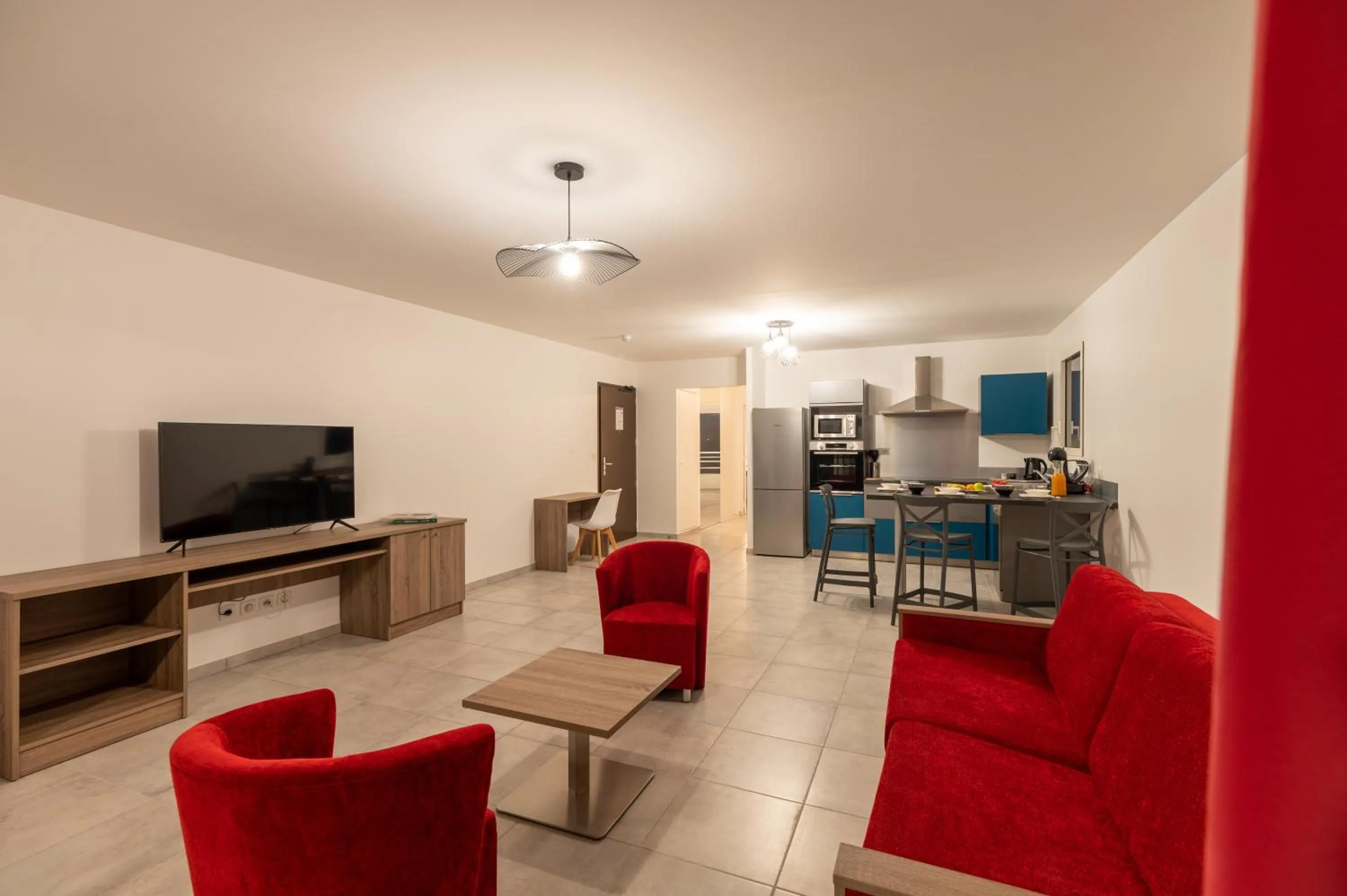 TV and multimedia in B&B HOME Fort-de-France Marina