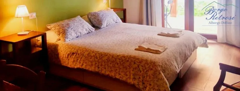 Bed in Albergo Diffuso Borgo Retrosi di Amatrice