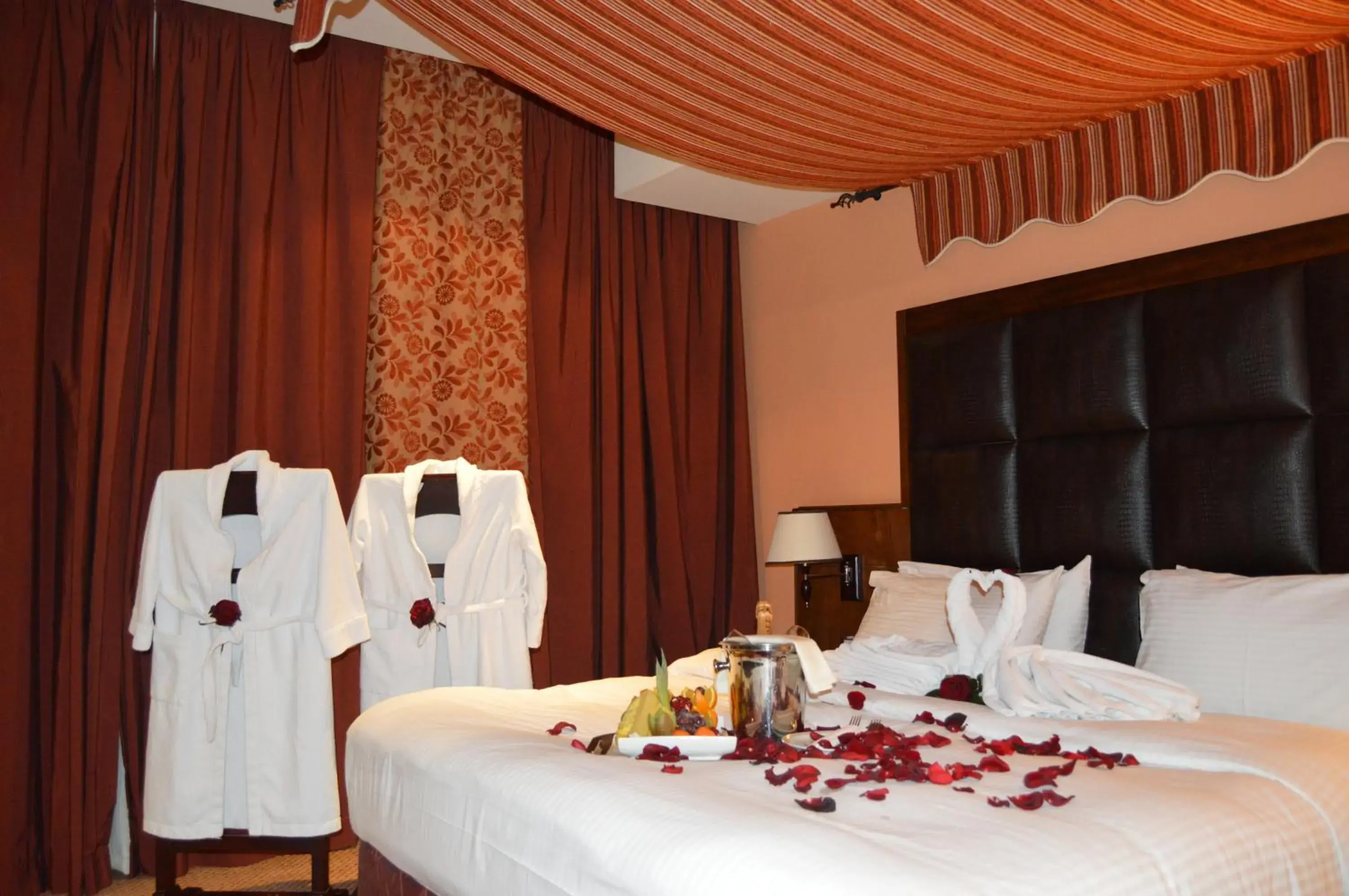 Decorative detail, Bed in Markazia Suites Decorative detail, Bed in Markazia Suites