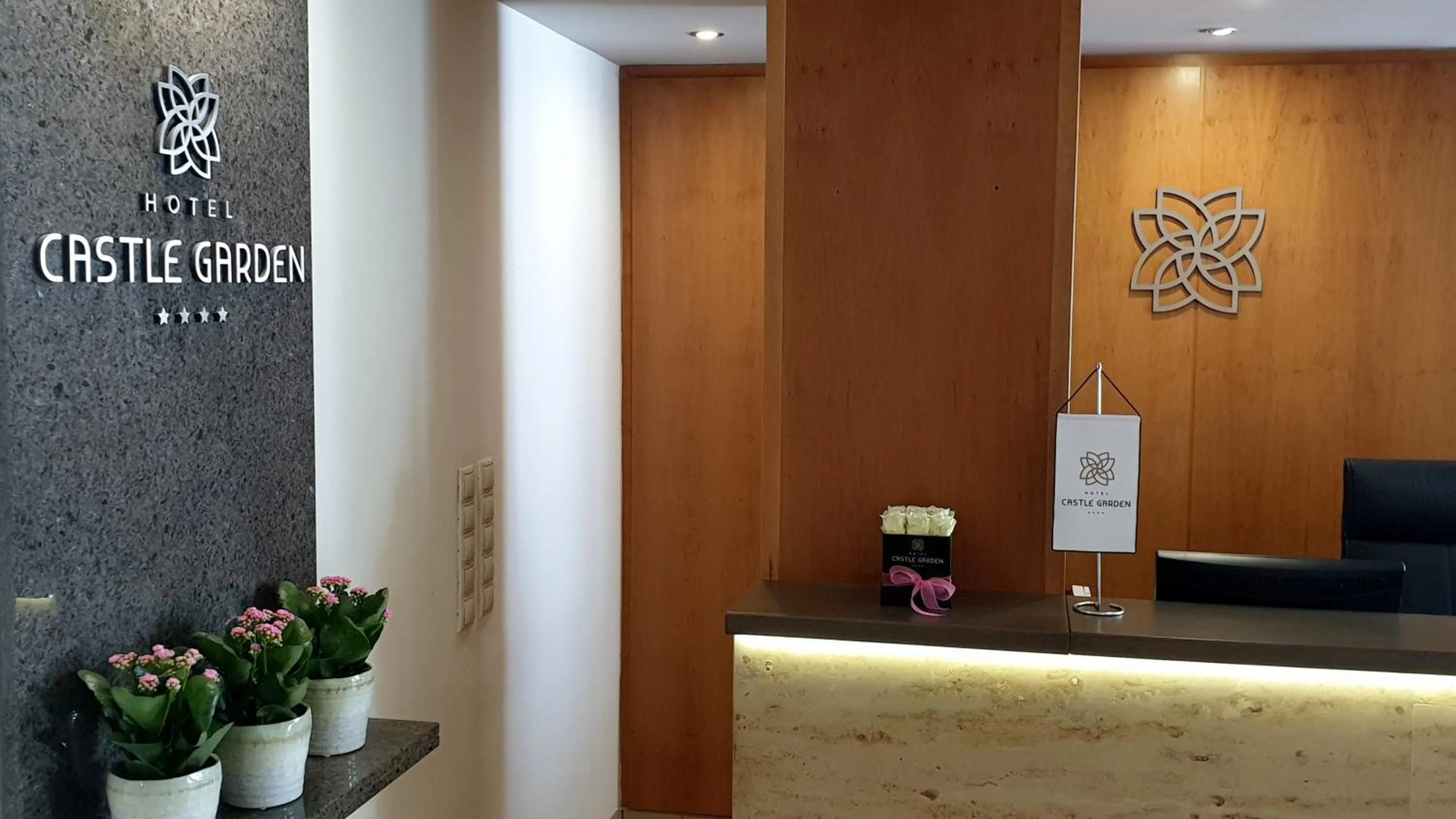 Property logo or sign in Hotel Castle Garden