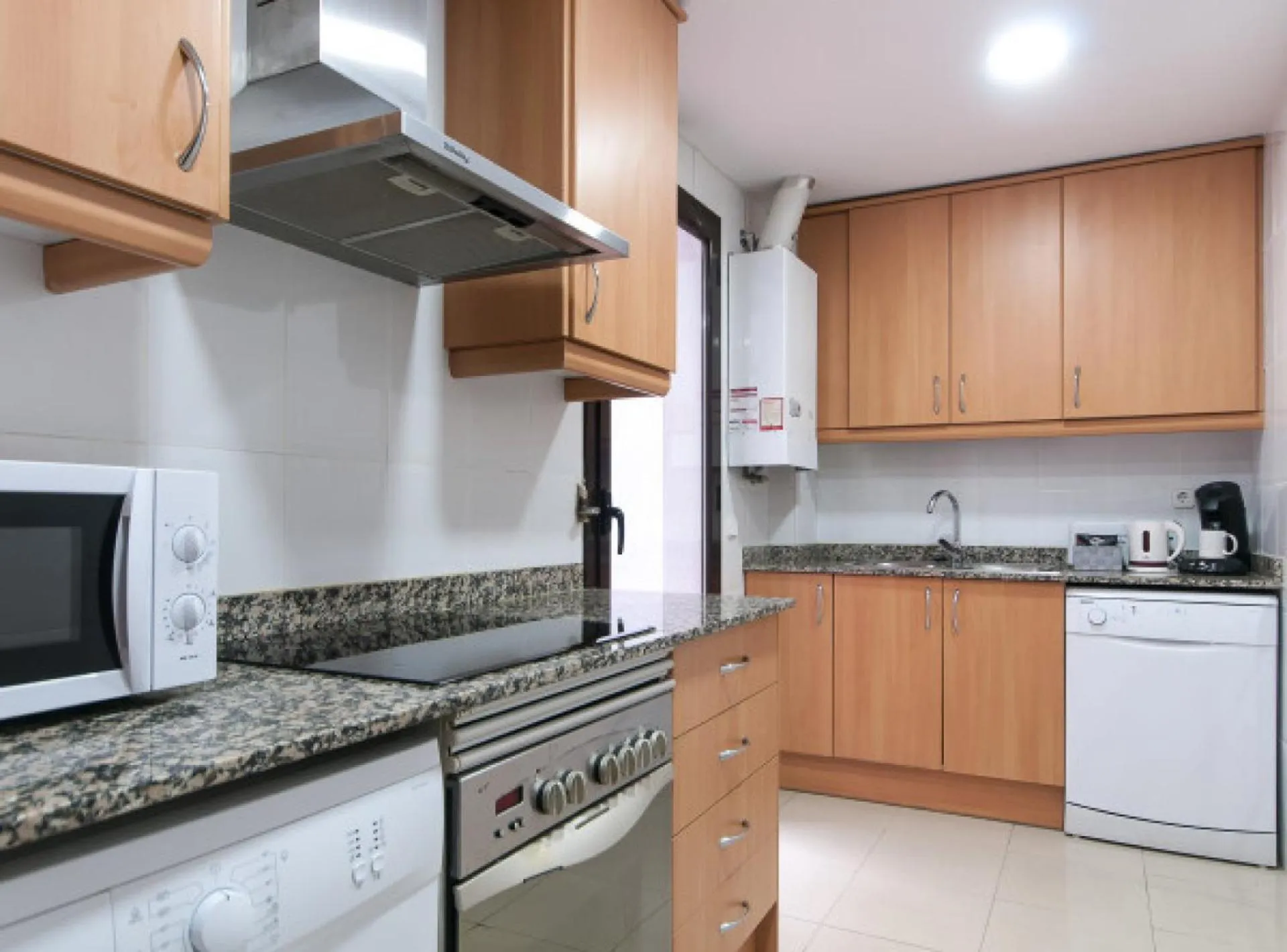 Kitchen or kitchenette in Picasso Suites