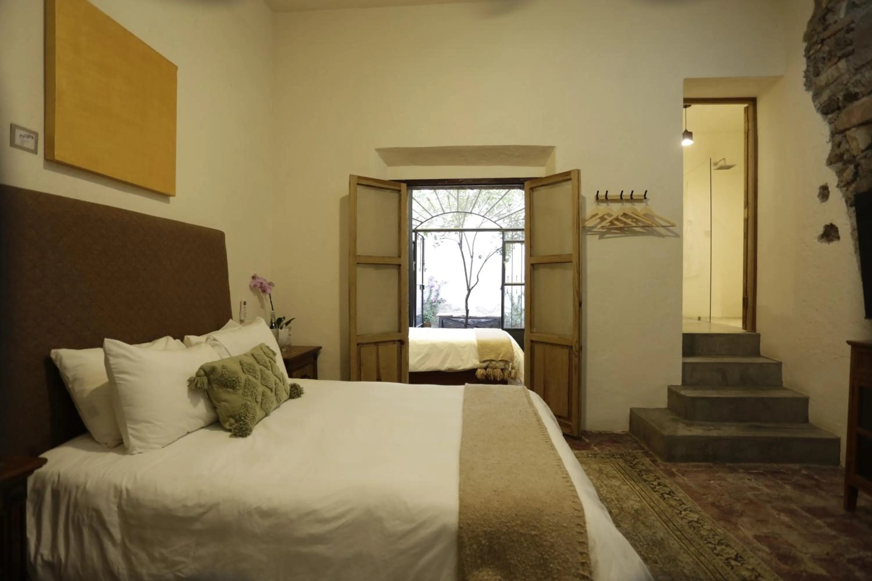 Photo of the whole room, Bed in Orchid House San Miguel de Allende