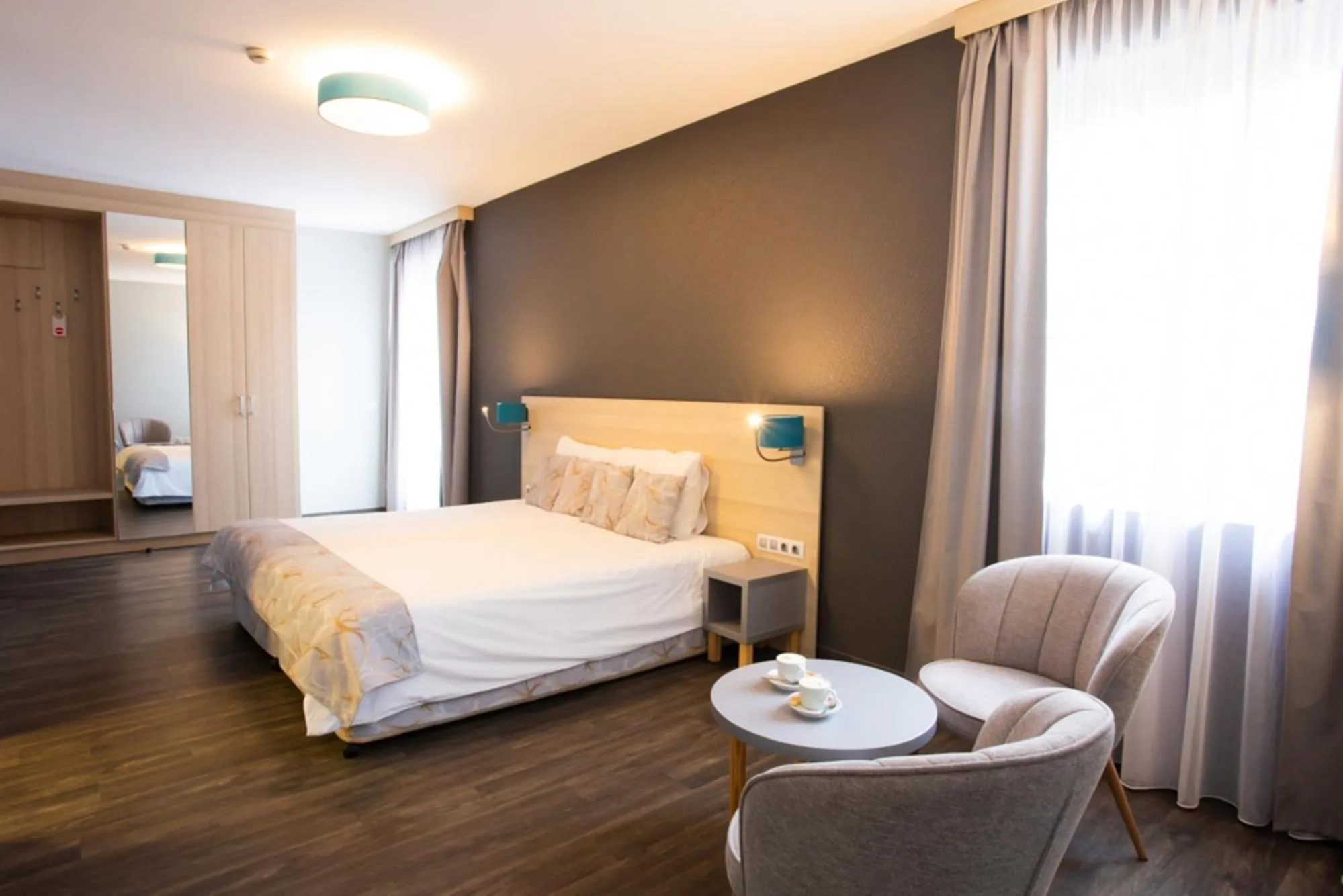 Bed in Hotel Regnum Residence