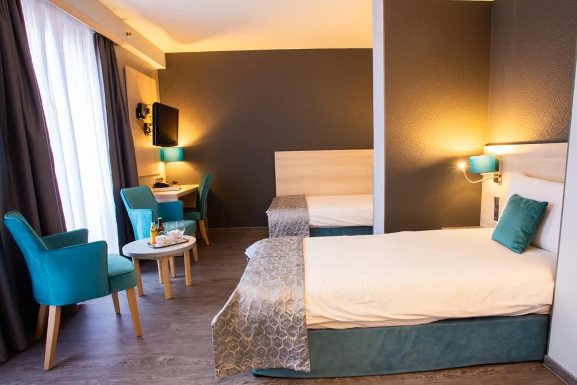 Bed in Hotel Regnum Residence