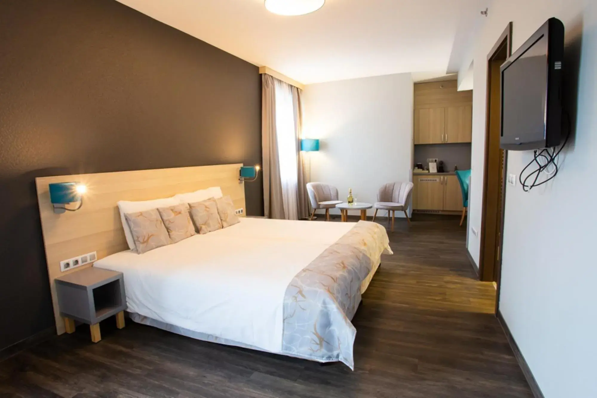 TV and multimedia, Bed in Hotel Regnum Residence TV and multimedia, Bed in Hotel Regnum Residence