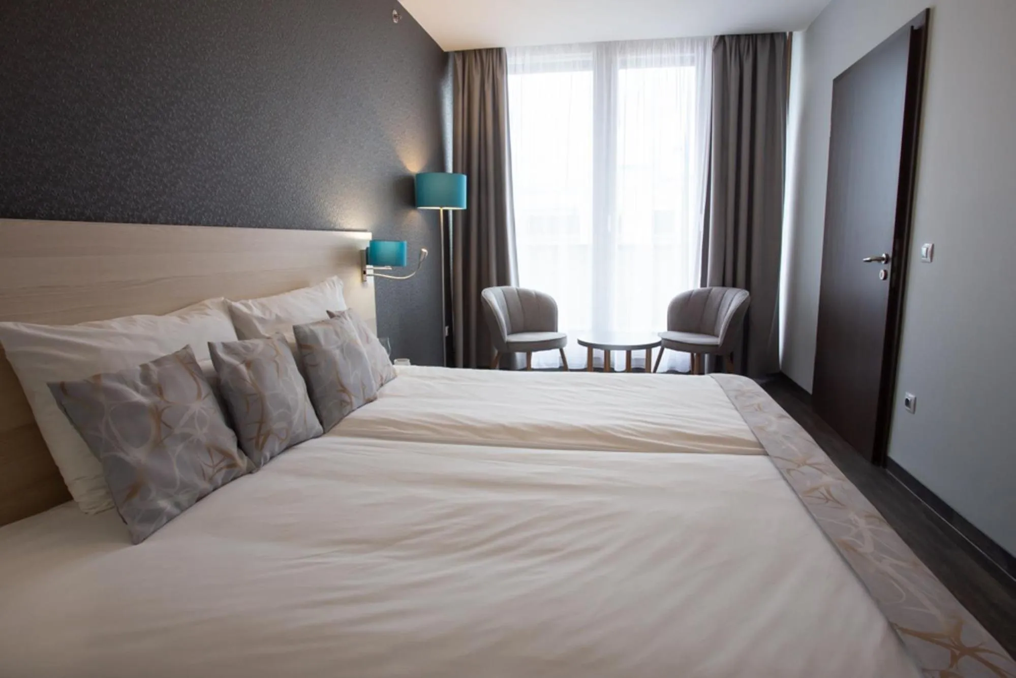 Bed in Hotel Regnum Residence