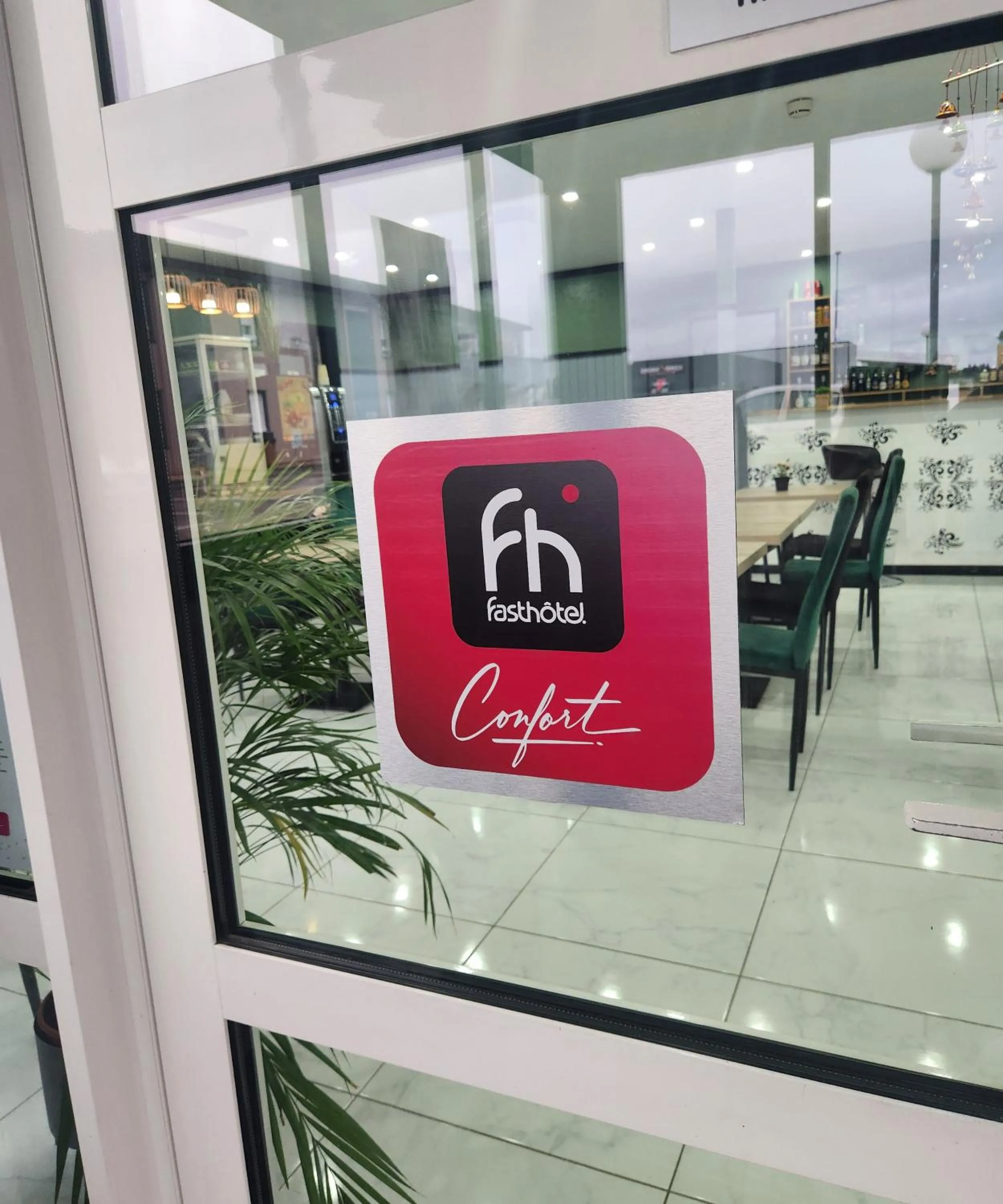 Property logo or sign in Fasthotel Le Mans Nord FH CONFORT