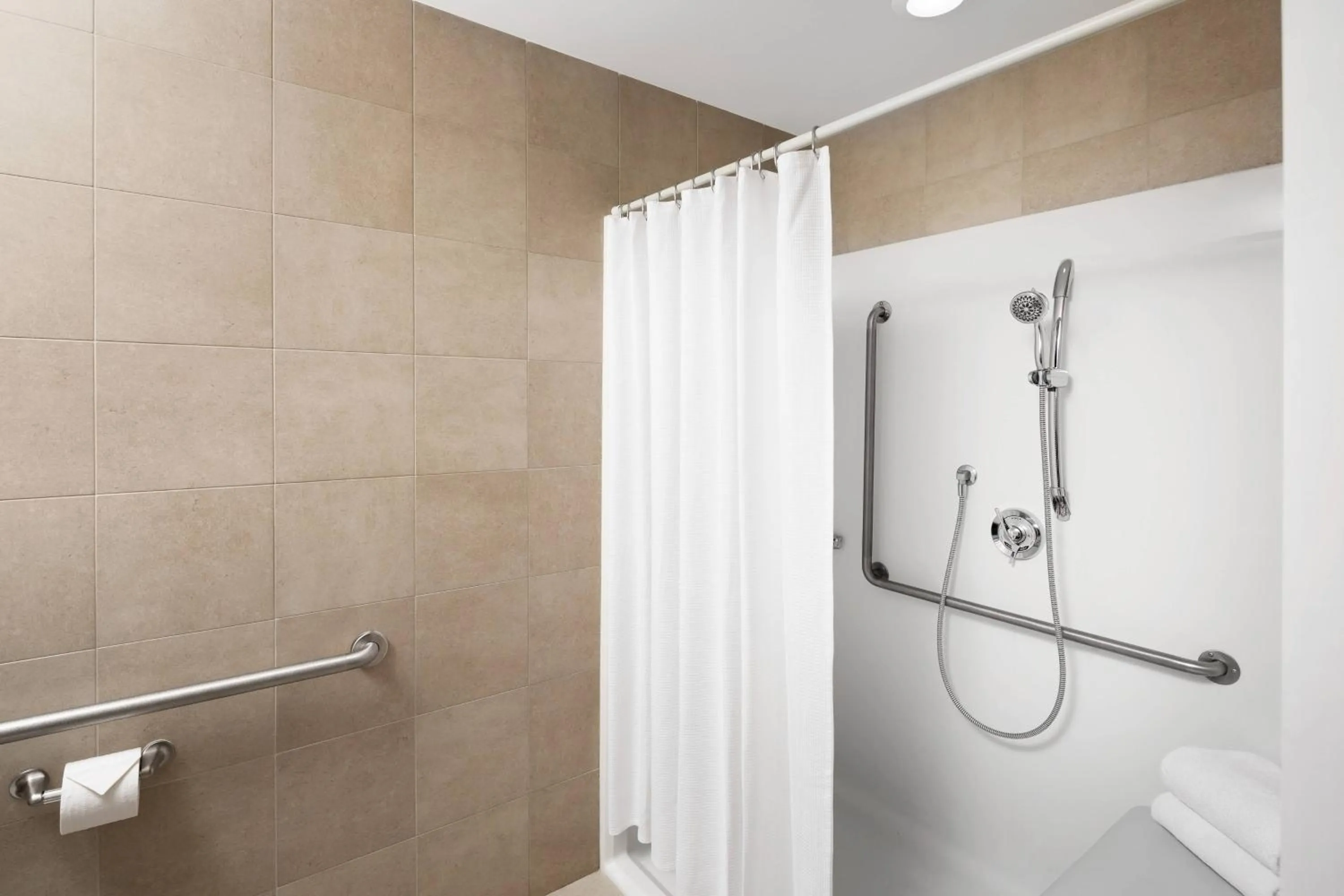 Bathroom in Delta Hotels by Marriott Calgary South