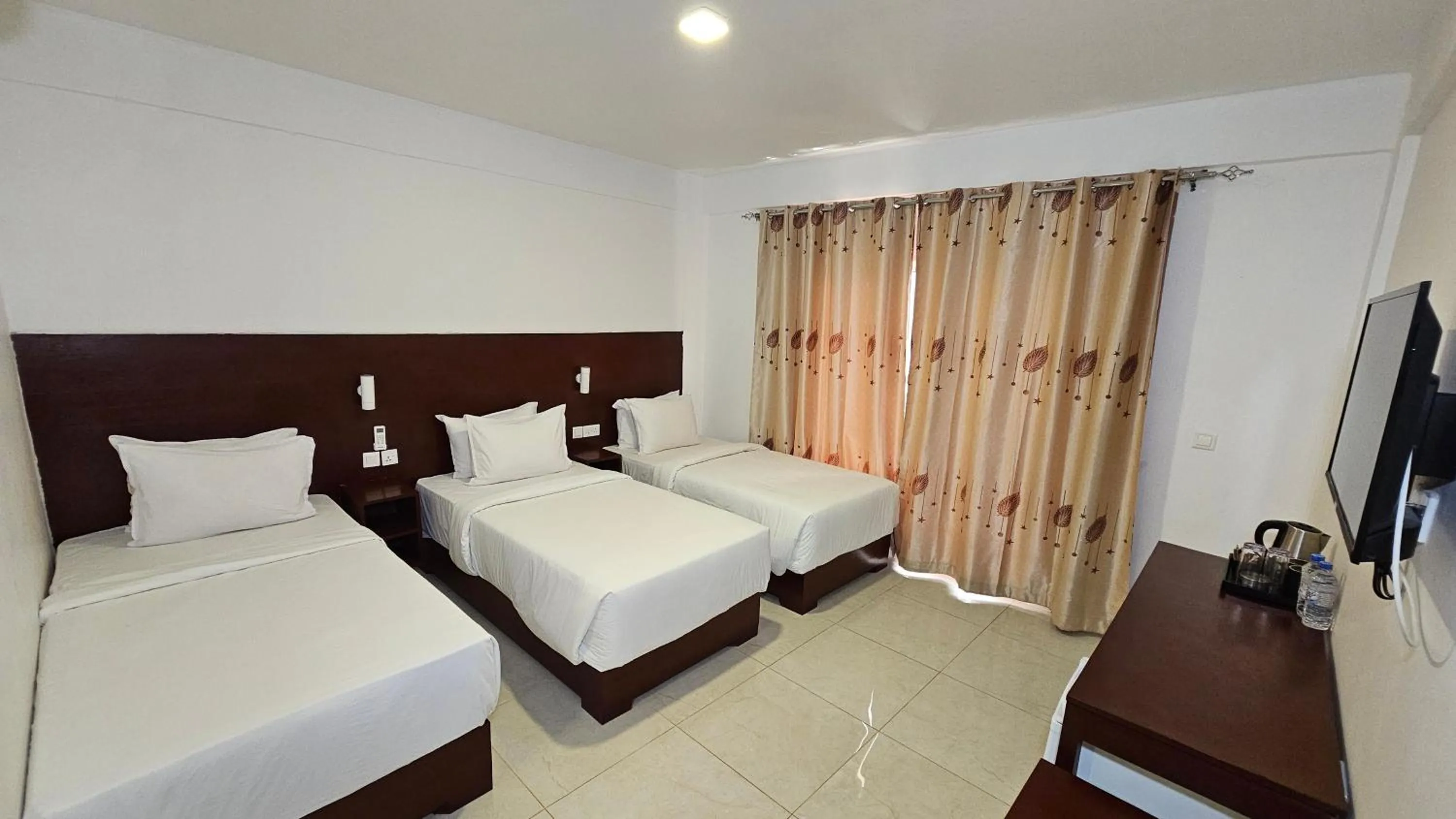 Bed in Malika Nungwi Hotel