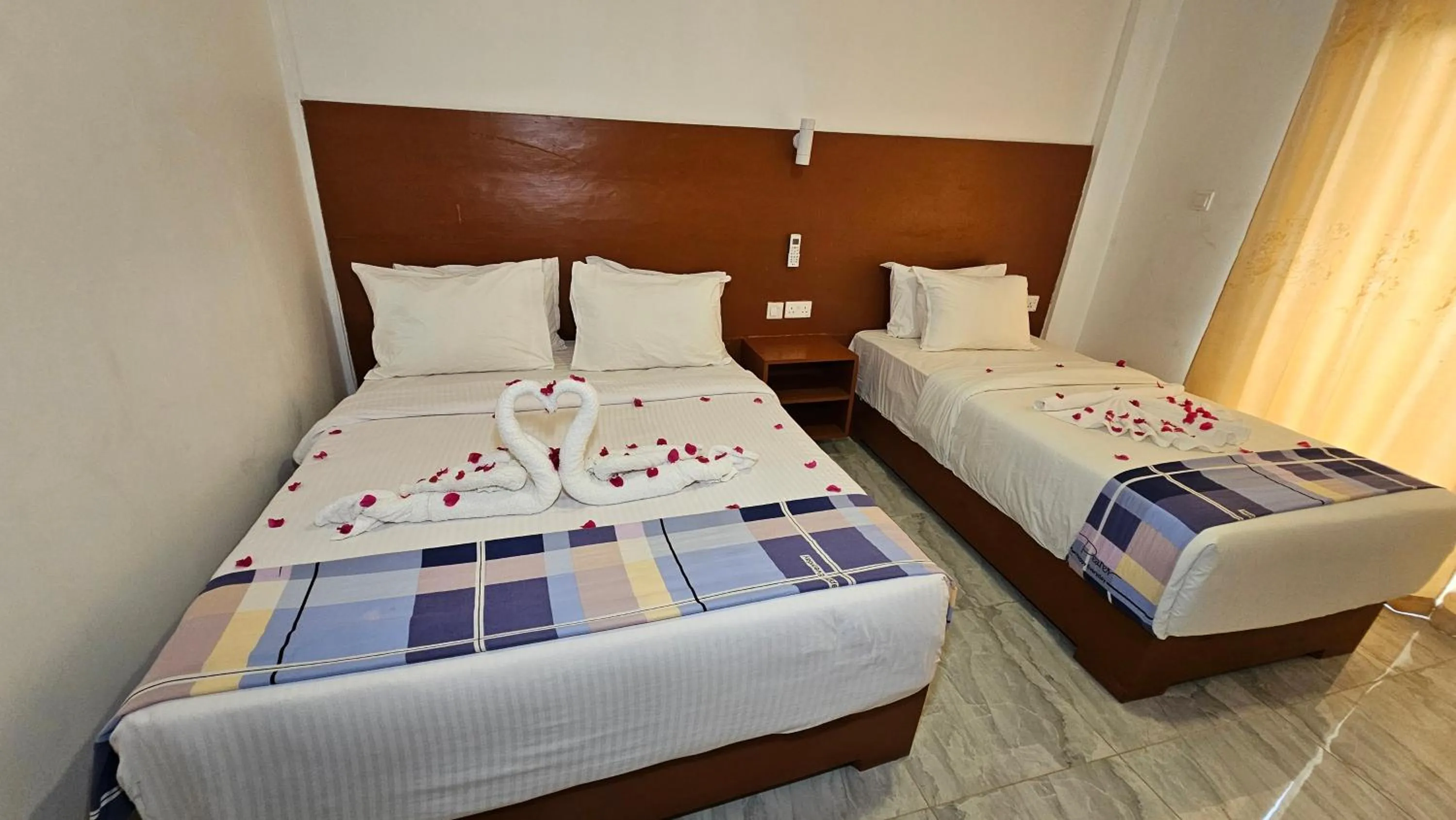 Bed in Malika Nungwi Hotel