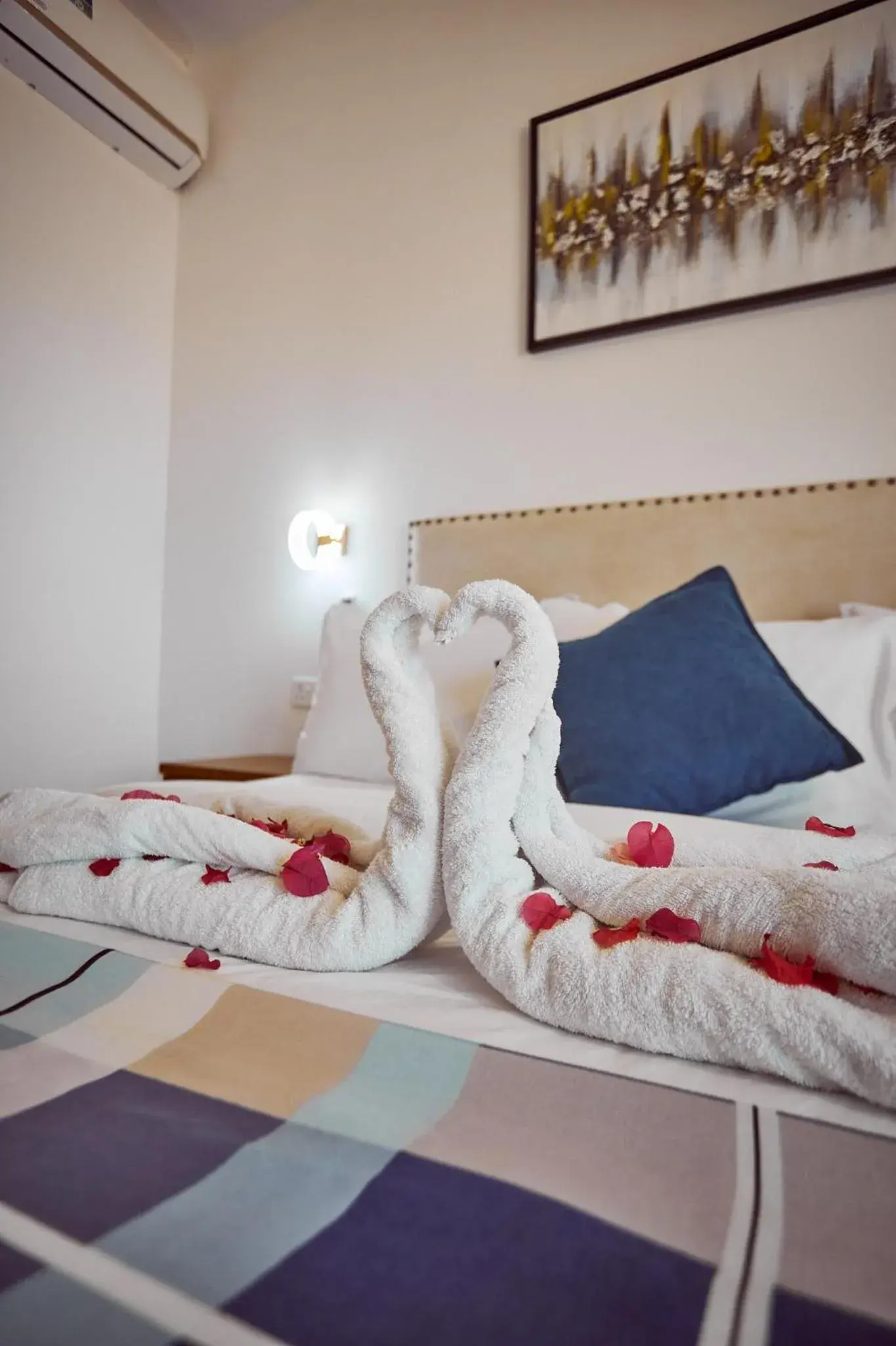 Bed in Malika Nungwi Hotel Bed in Malika Nungwi Hotel