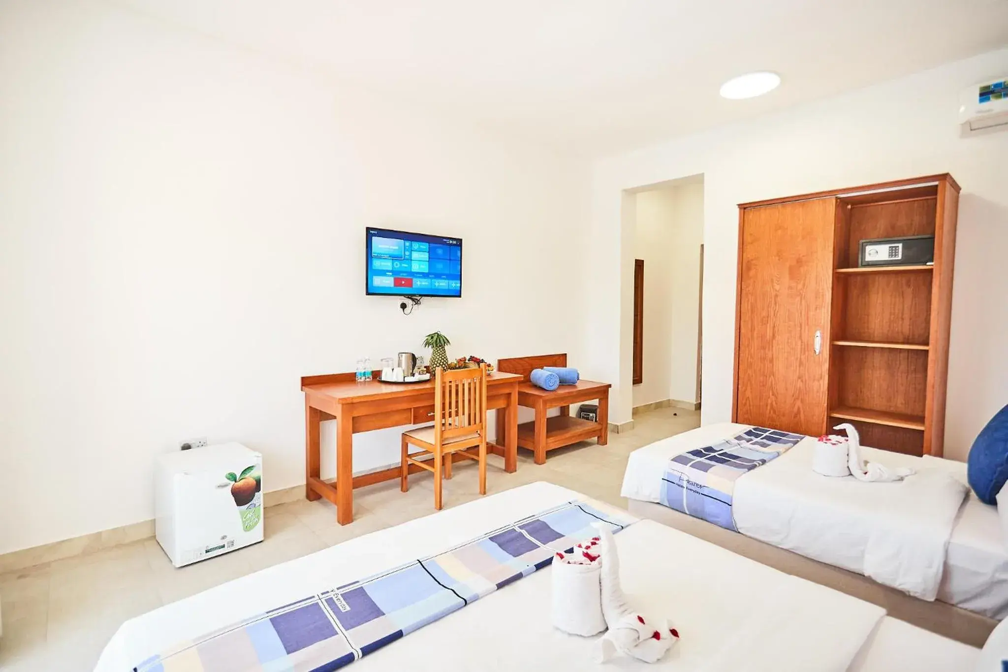 Bed in Malika Nungwi Hotel Bed in Malika Nungwi Hotel