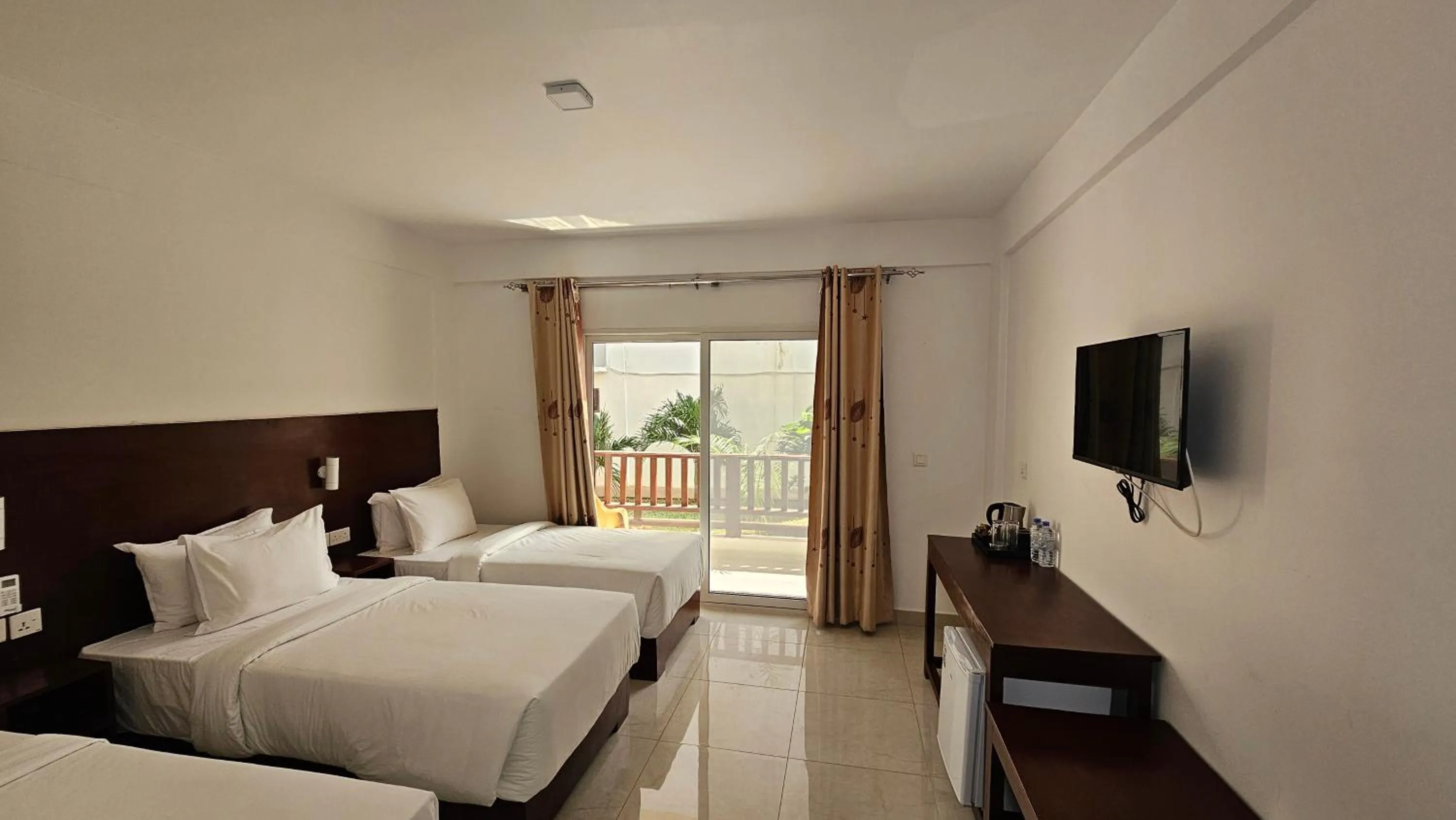 Bed in Malika Nungwi Hotel