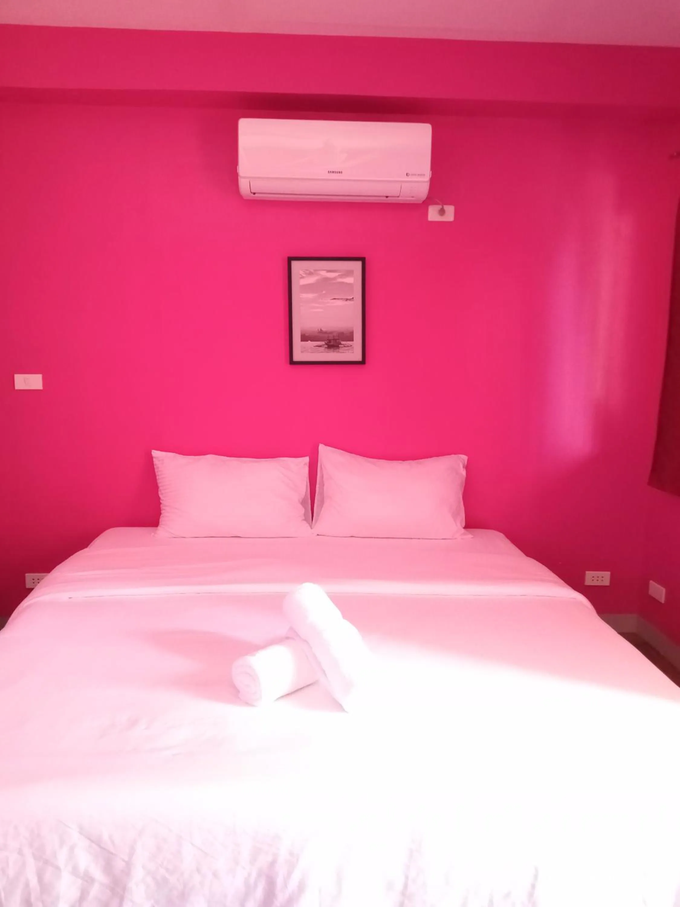 Bed in In Dai Aquasports and Beach Resort