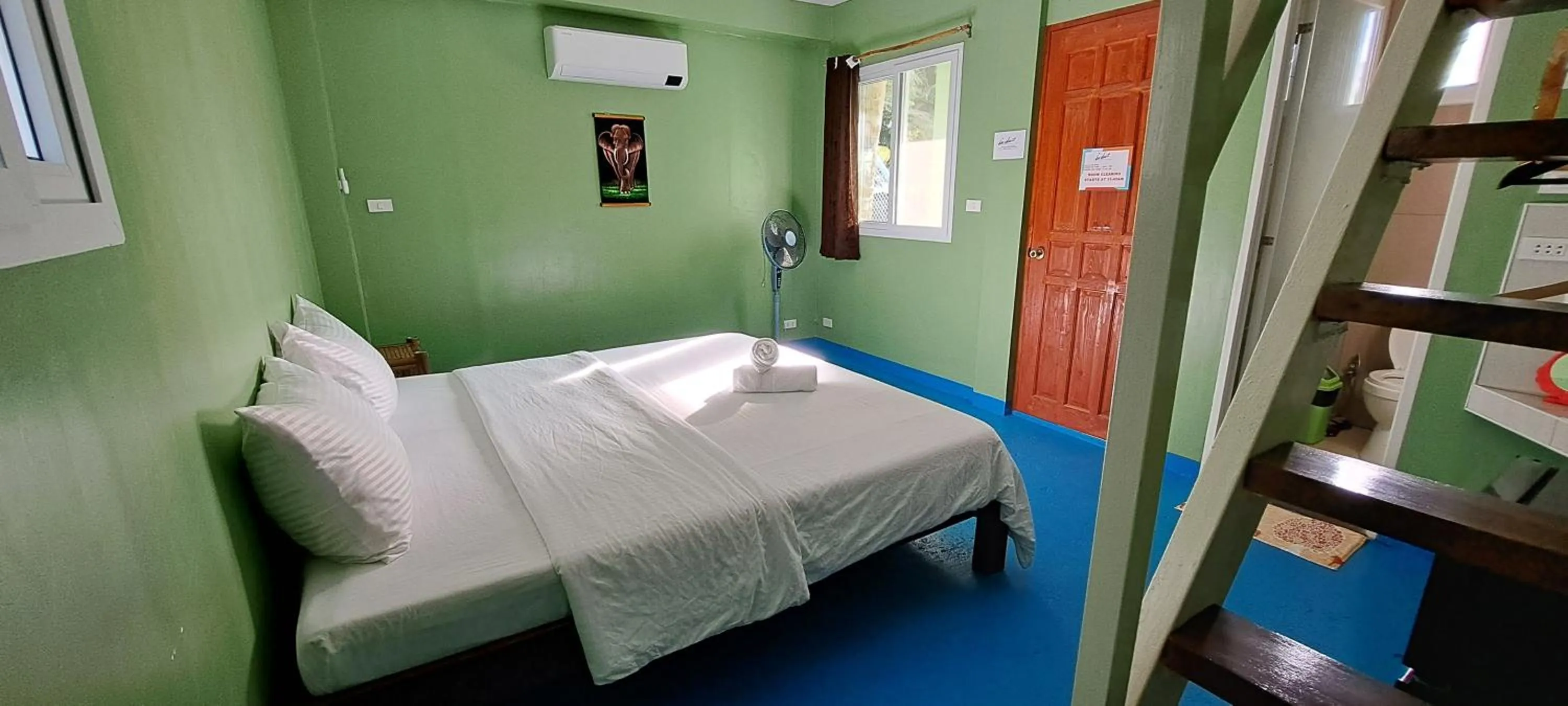 Bed in In Dai Aquasports and Beach Resort