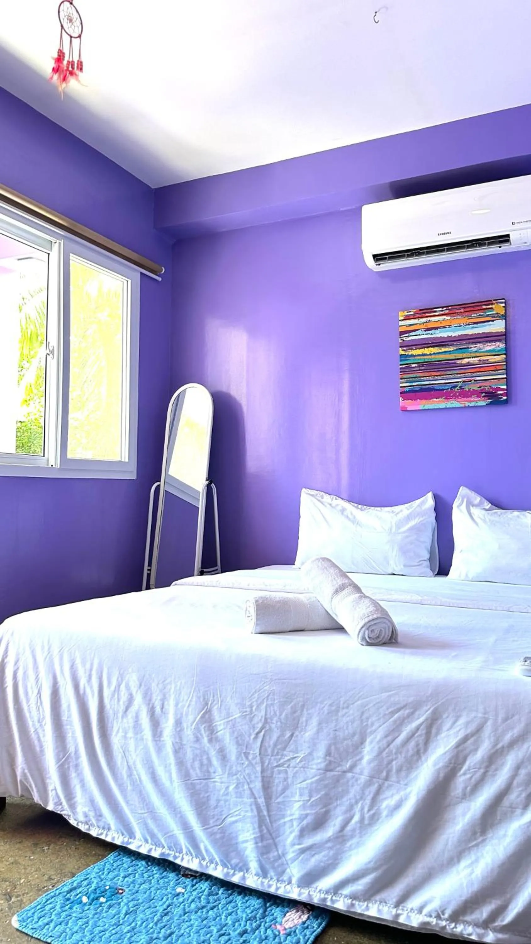 Bed in In Dai Aquasports and Beach Resort