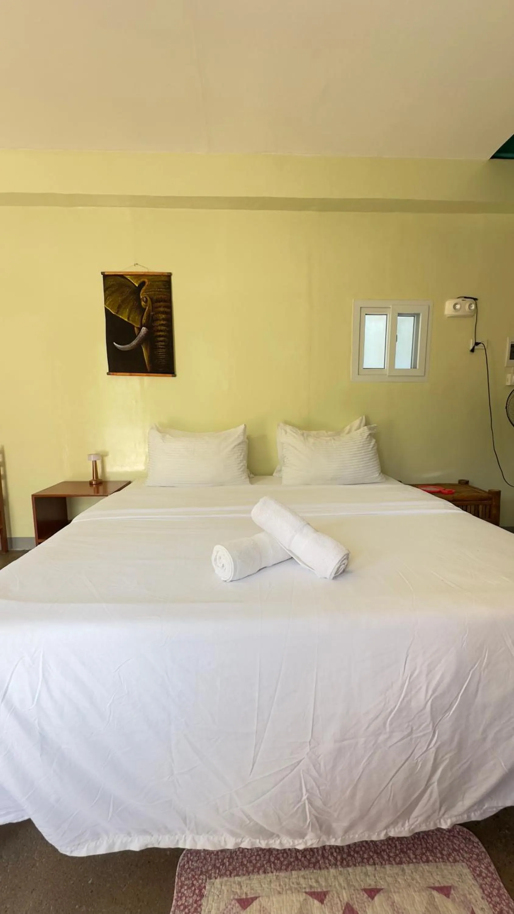 Bed in In Dai Aquasports and Beach Resort