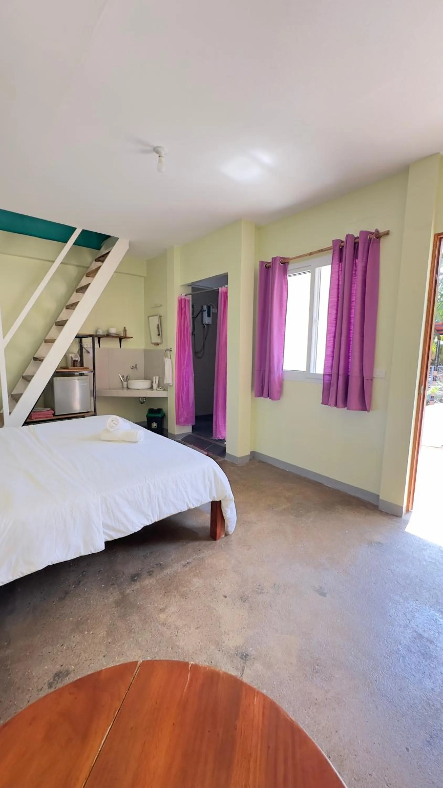 Bed in In Dai Aquasports and Beach Resort