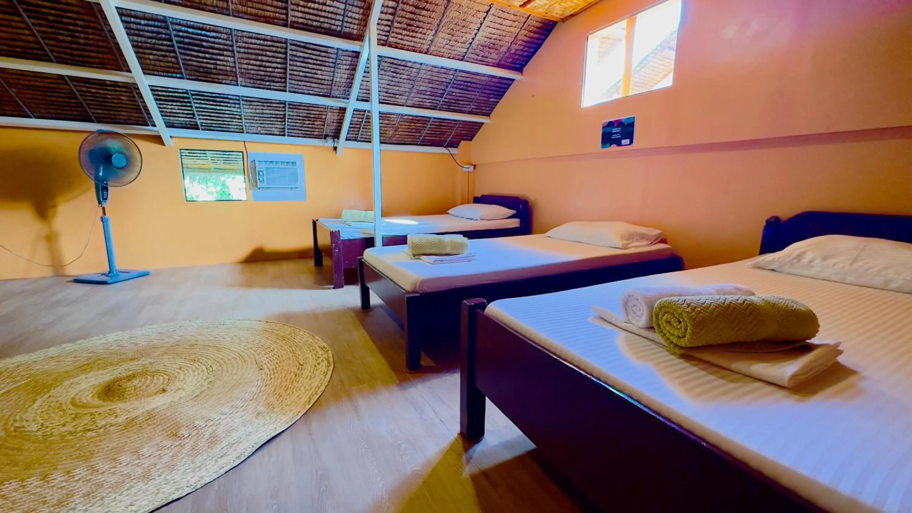 Bed in In Dai Aquasports and Beach Resort