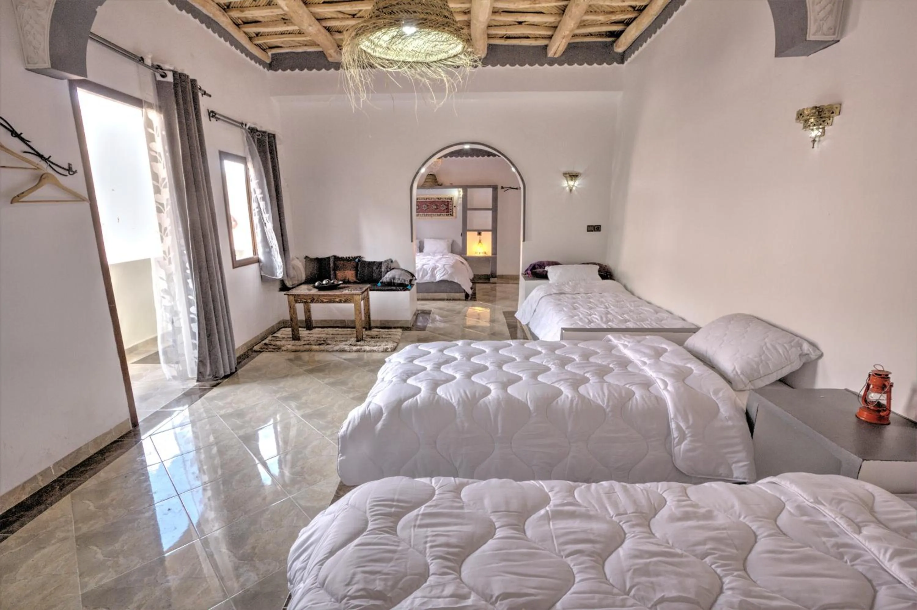 Photo of the whole room, Bed in Miguirne Chez Ali