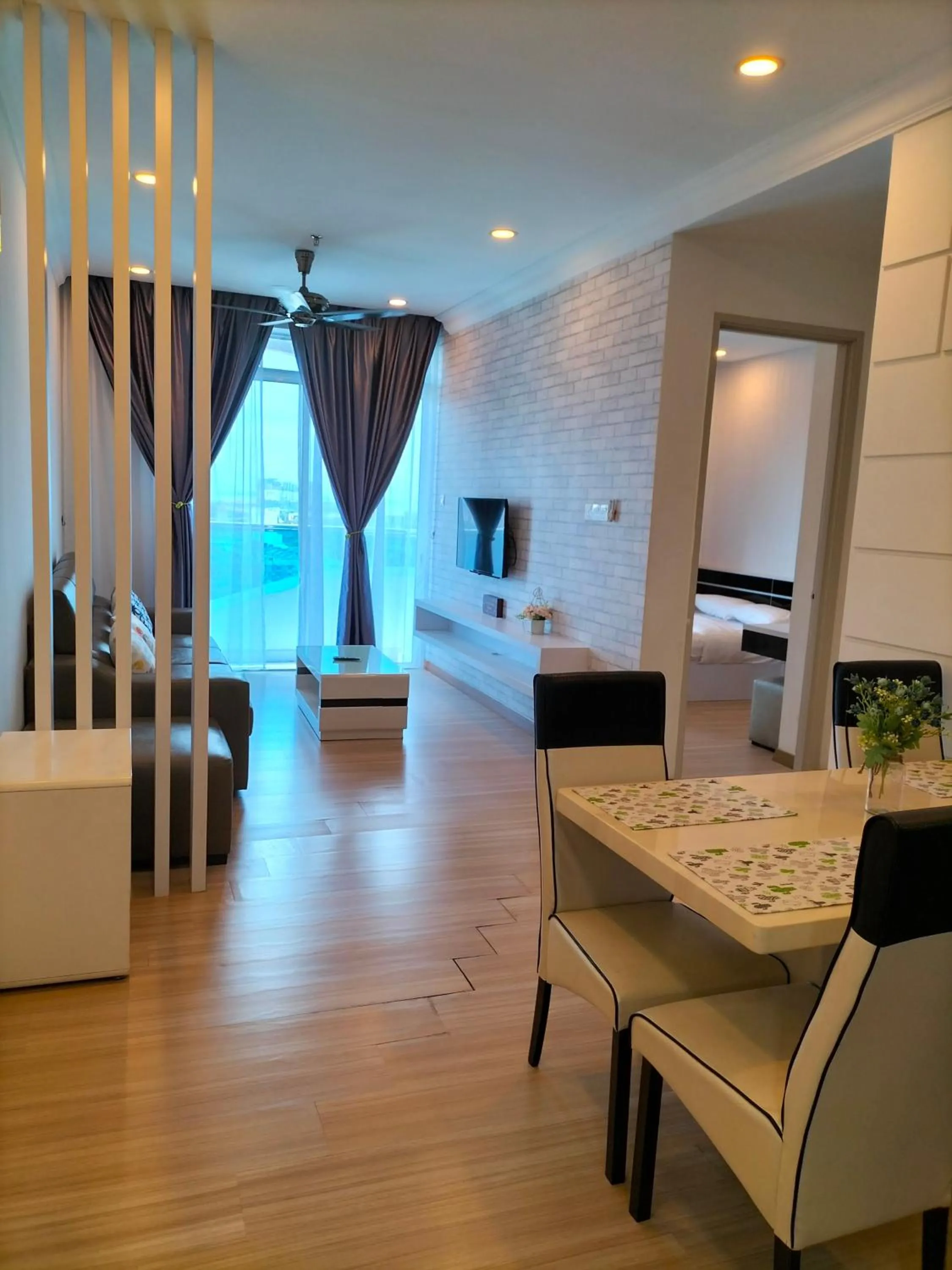 Living room, Bed in My Home The Wave Malacca Homestay