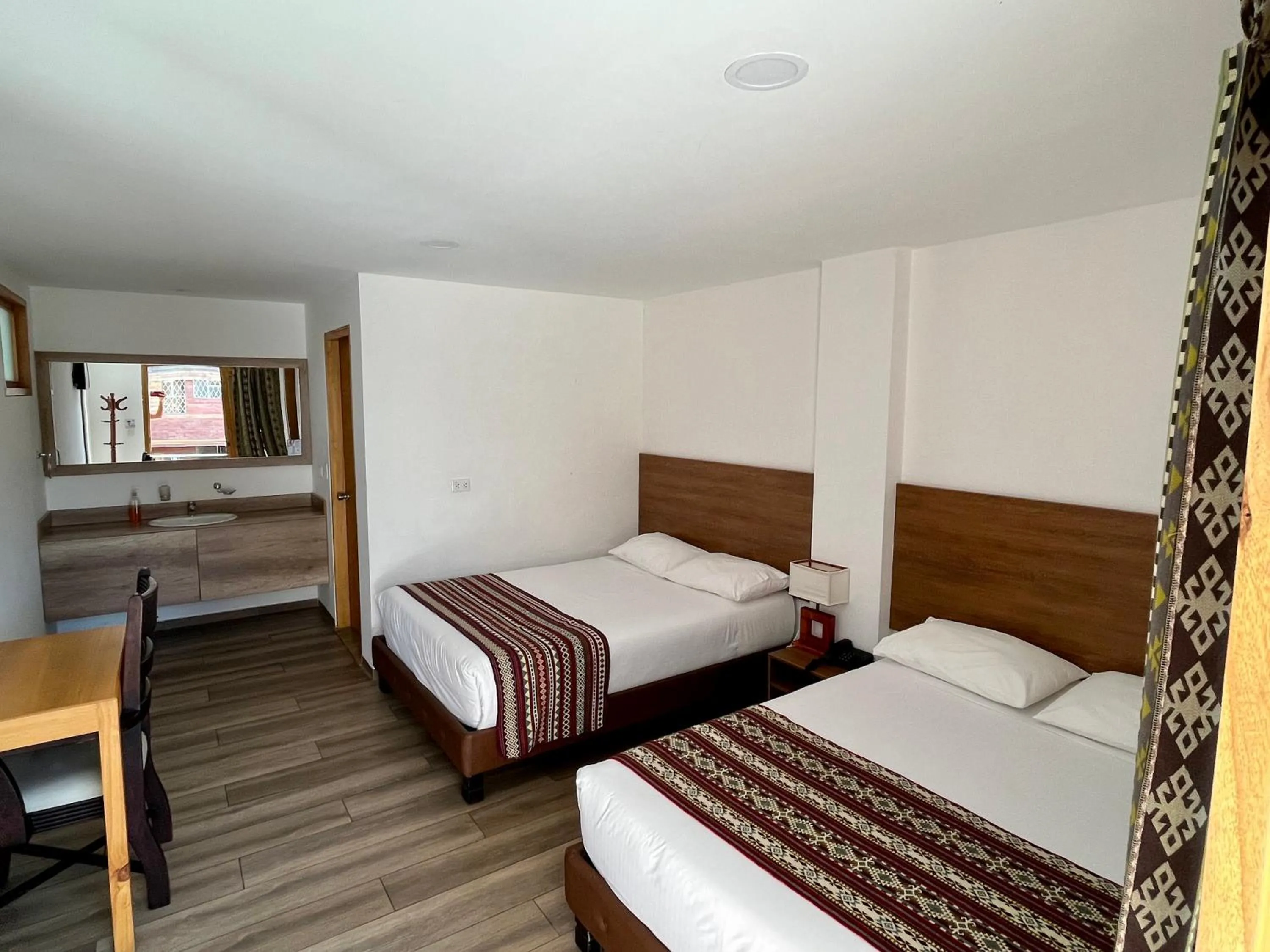 Double Room with Two Double Beds in Hotel El Geranio