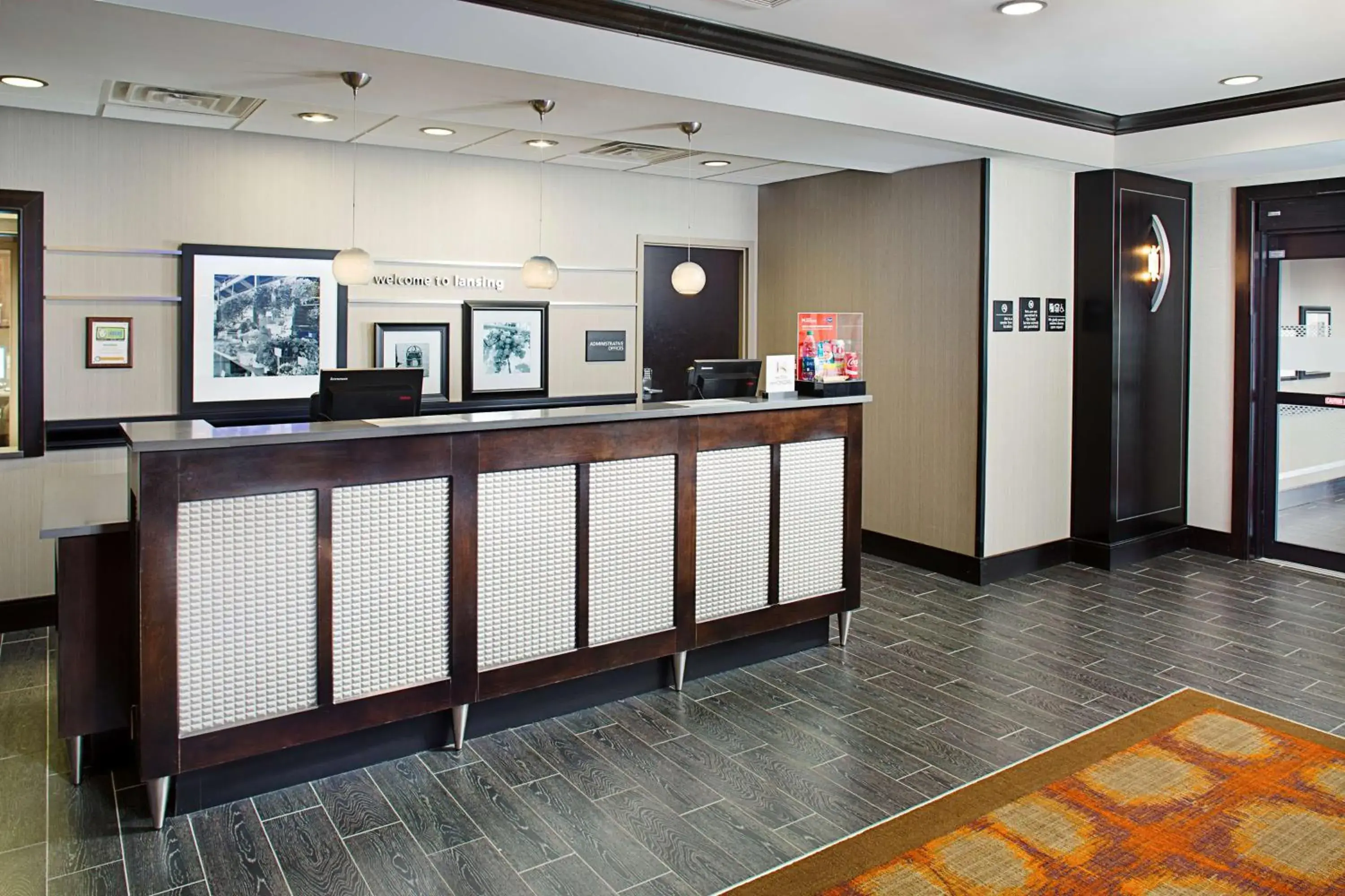 Lobby or reception in Hampton Inn & Suites Lansing West Lobby or reception in Hampton Inn & Suites Lansing West