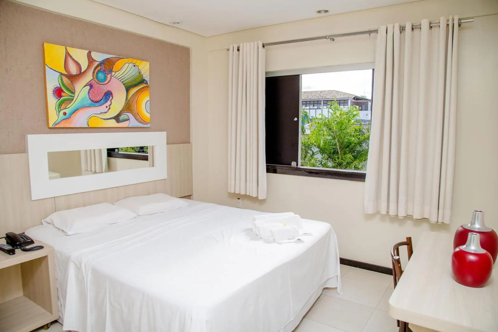 Bed in Eunapolis Plaza Hotel