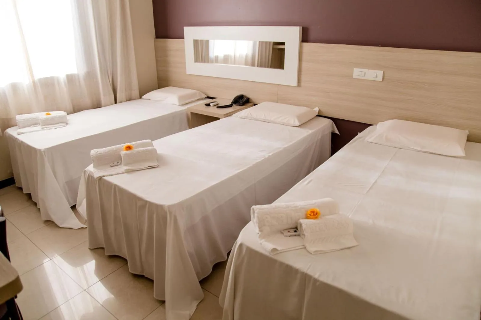 Bed in Eunapolis Plaza Hotel