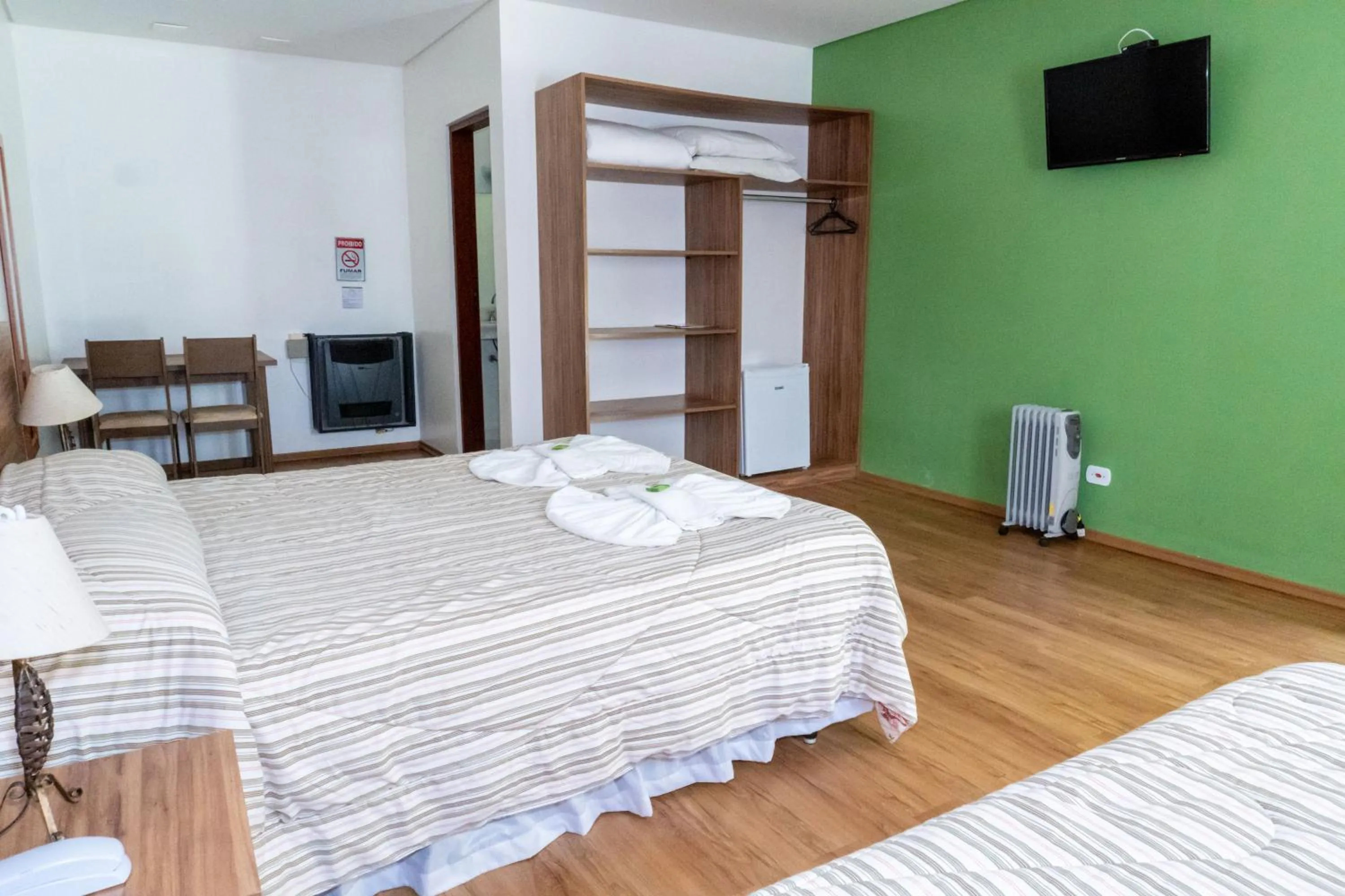 Bed in Pousada Recanto Feliz