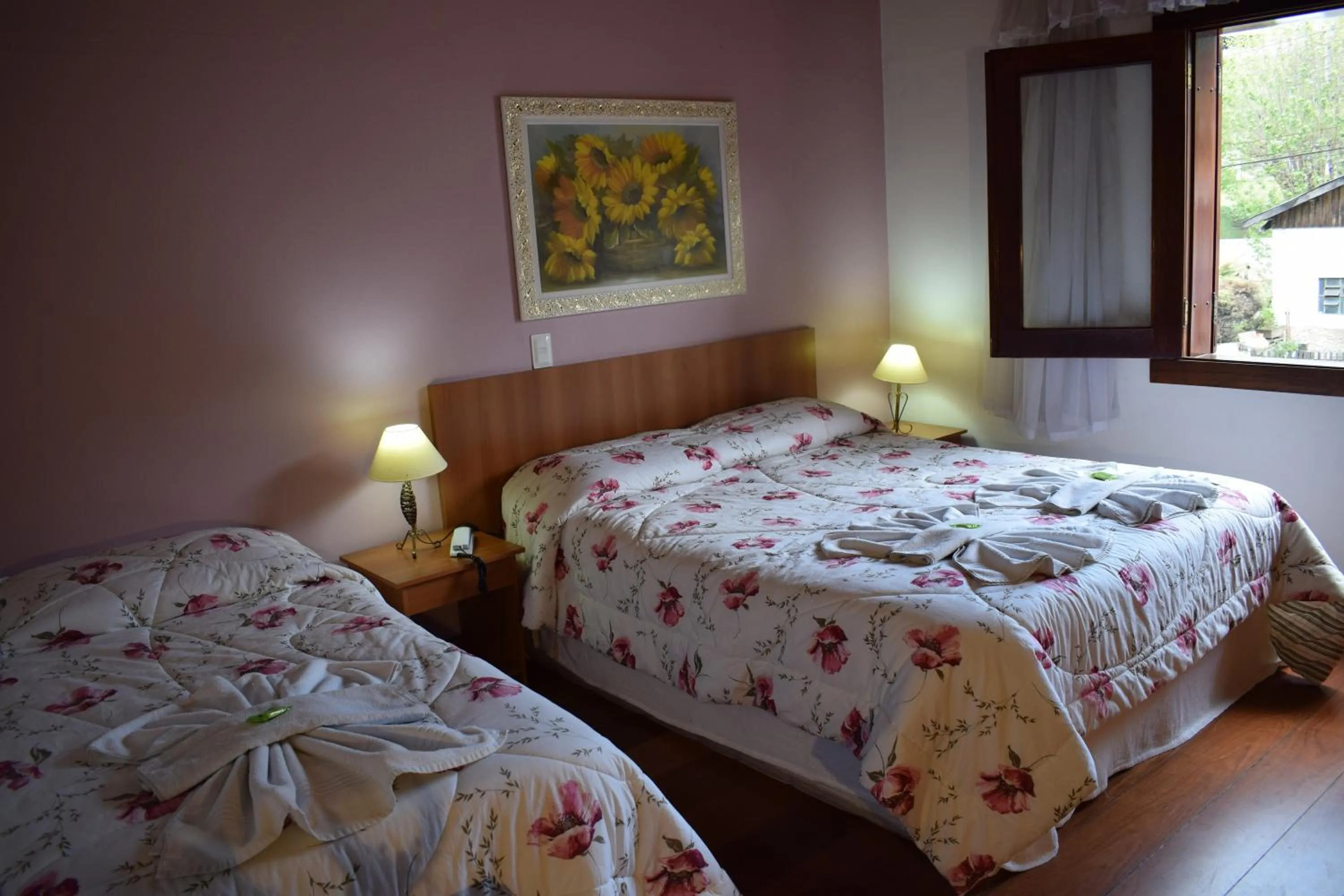 Bed in Pousada Recanto Feliz