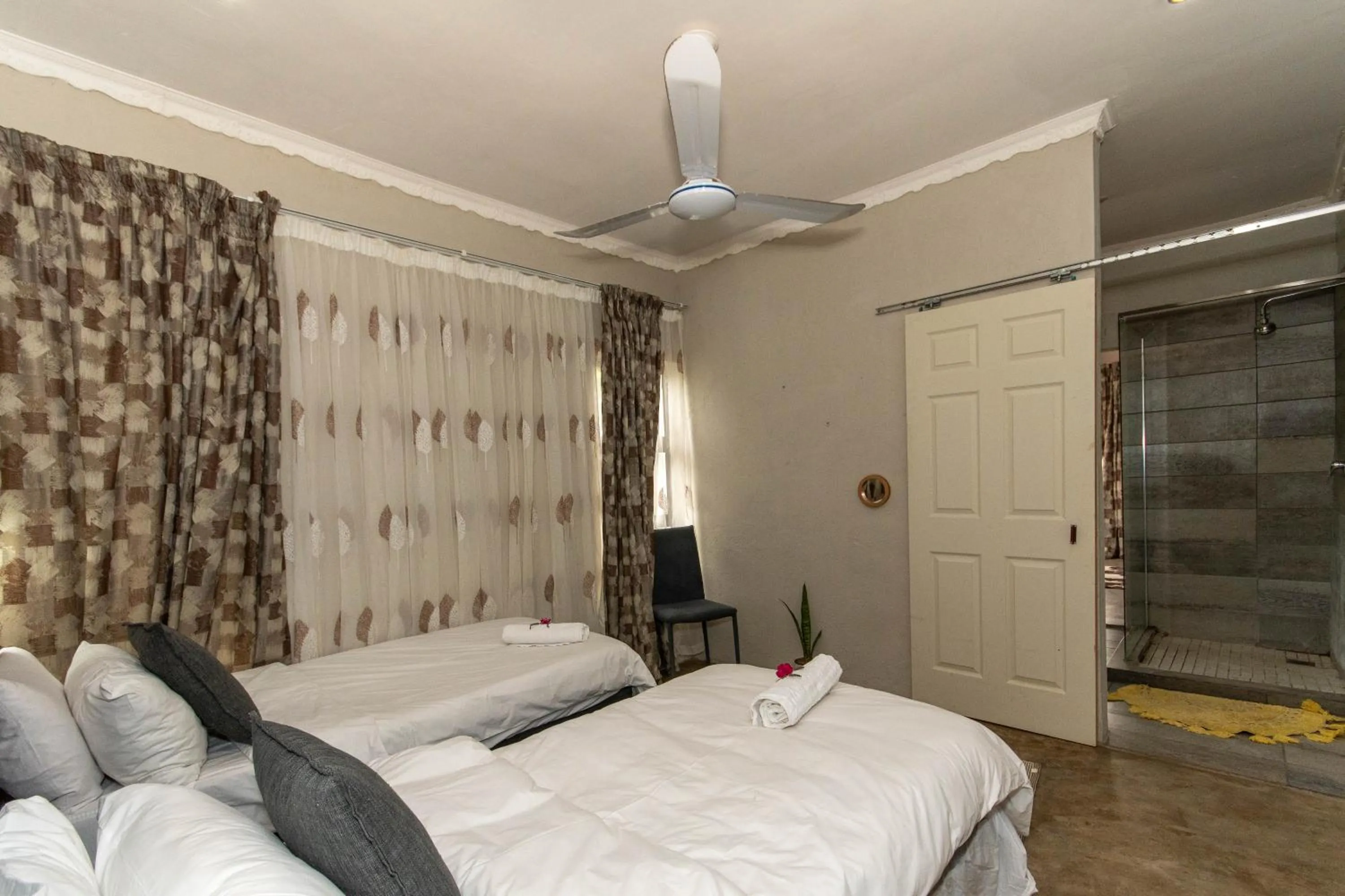 Bed in Woodpeckers Guest House