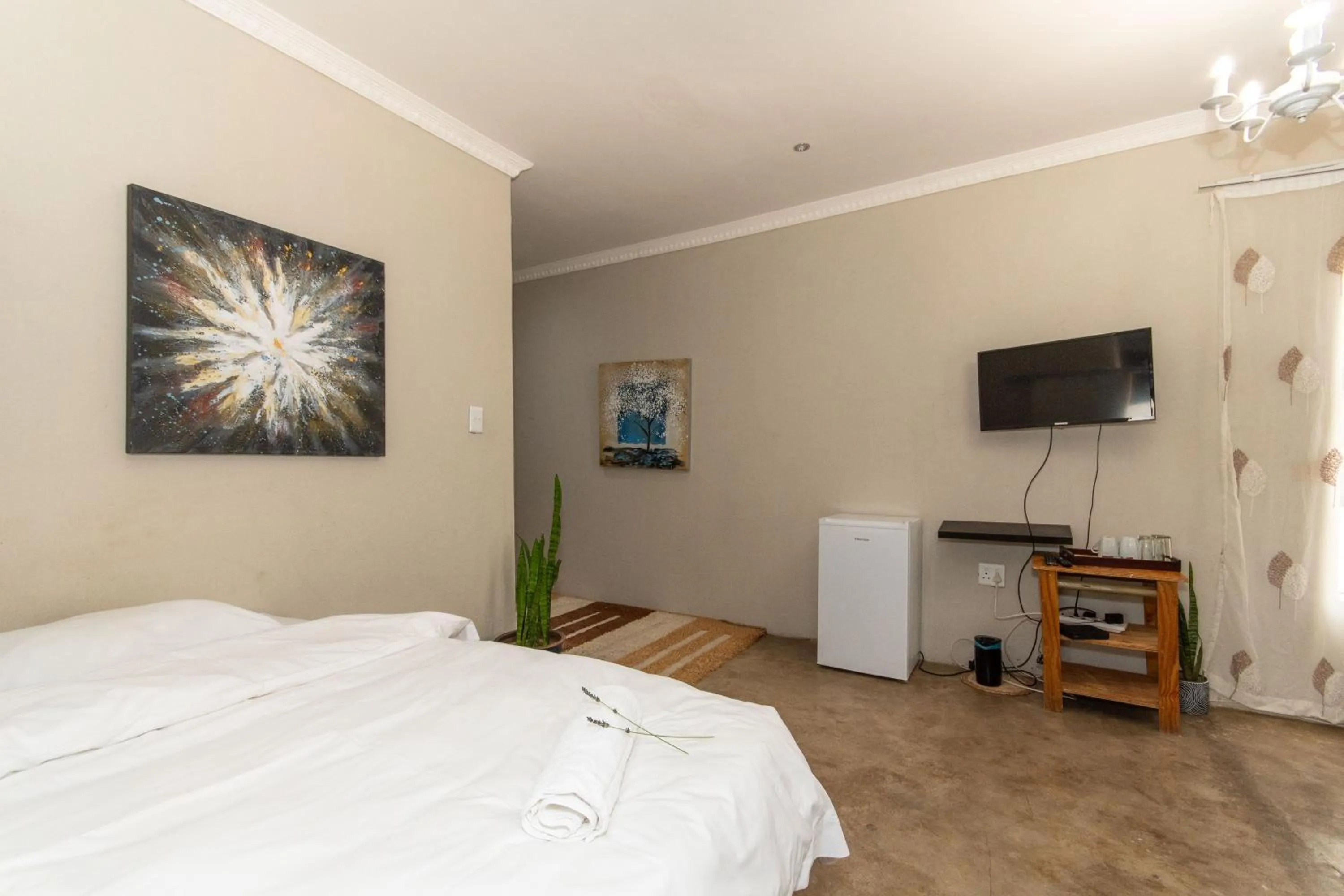 Bed in Woodpeckers Guest House