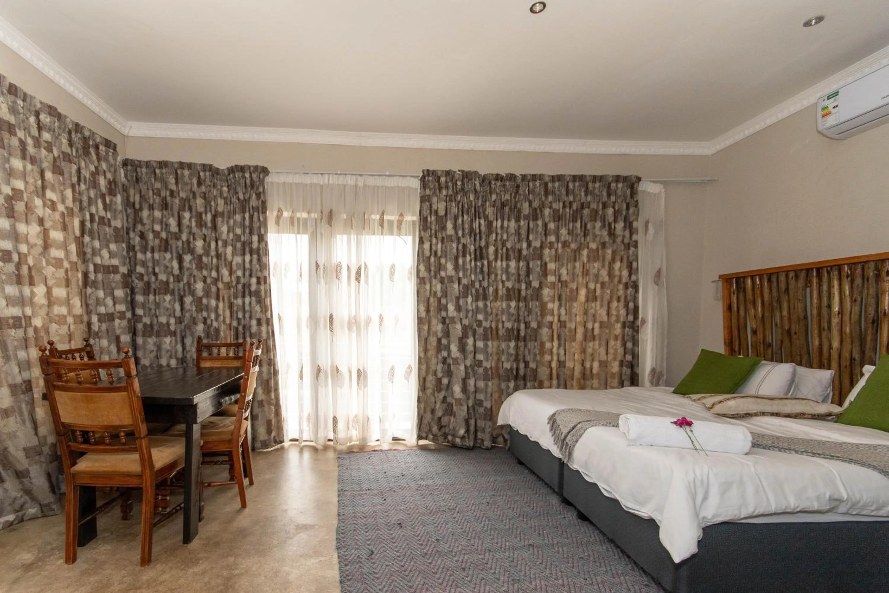 Bed in Woodpeckers Guest House