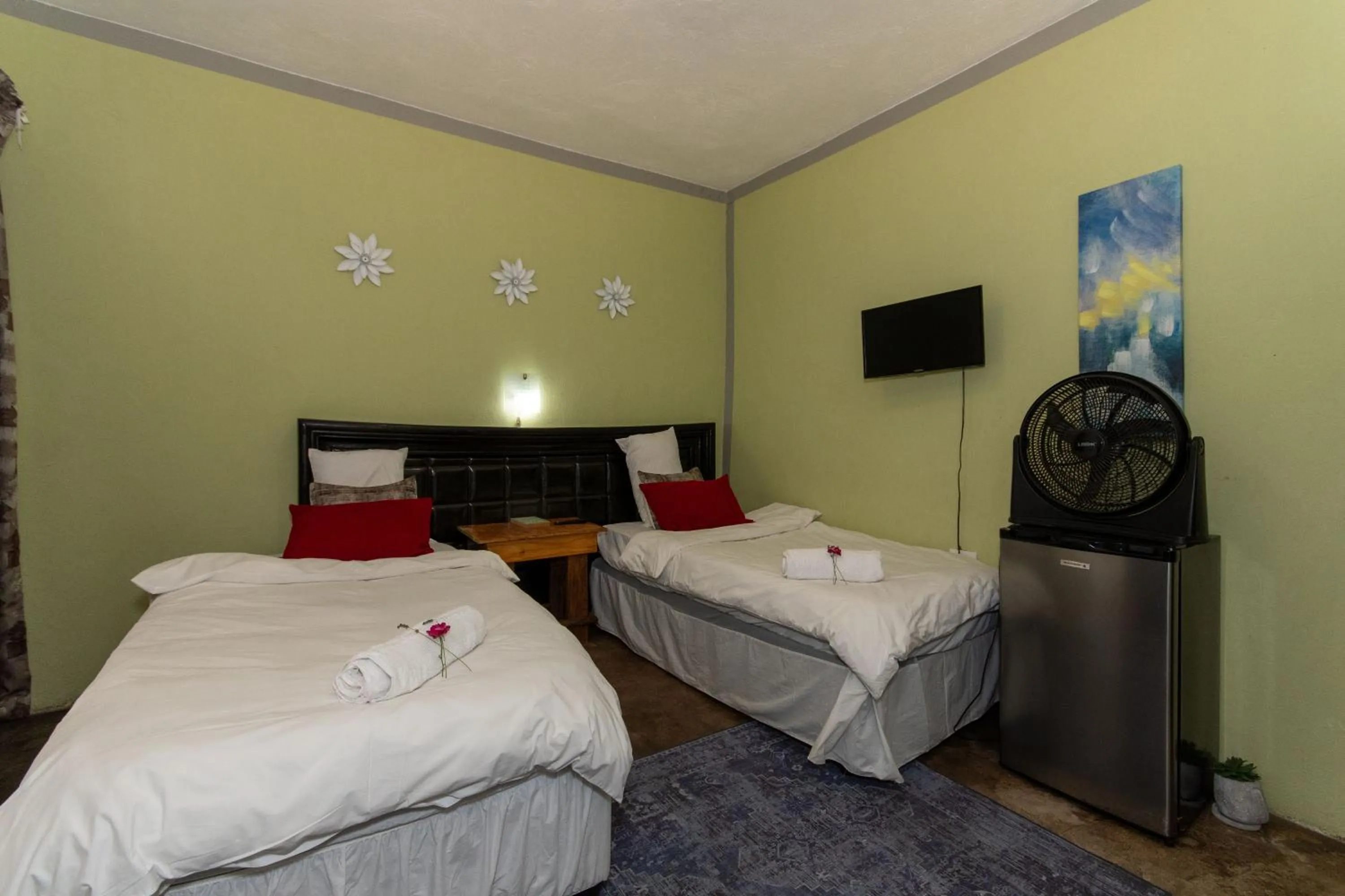 Bed in Woodpeckers Guest House