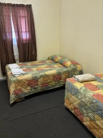 Bed in Broken Hill Tourist Lodge