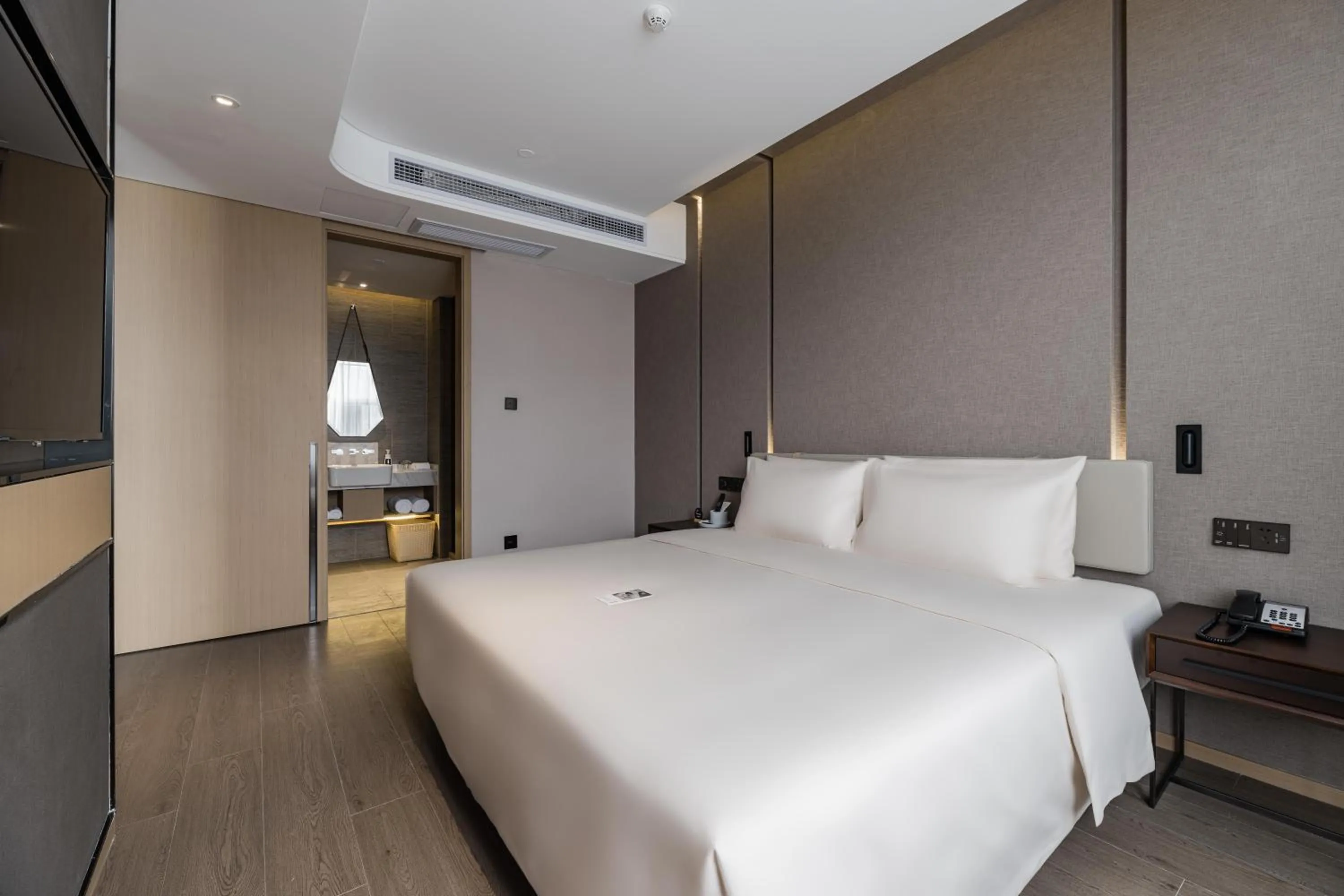 Bed in Atour Hotel Industrial Park Dongsha Lake