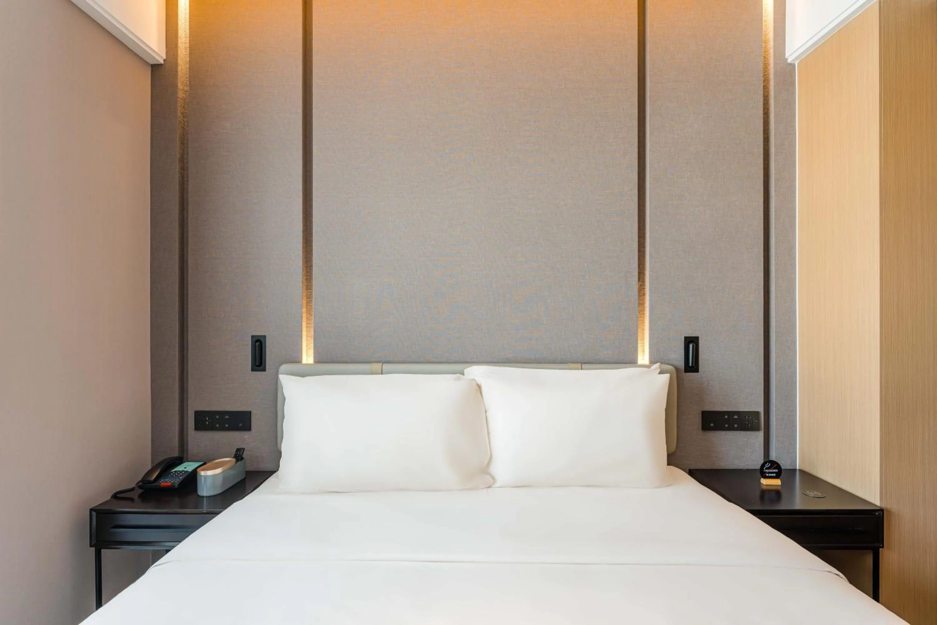 Bed in Atour Hotel Suzhou Mudu Ancient Town