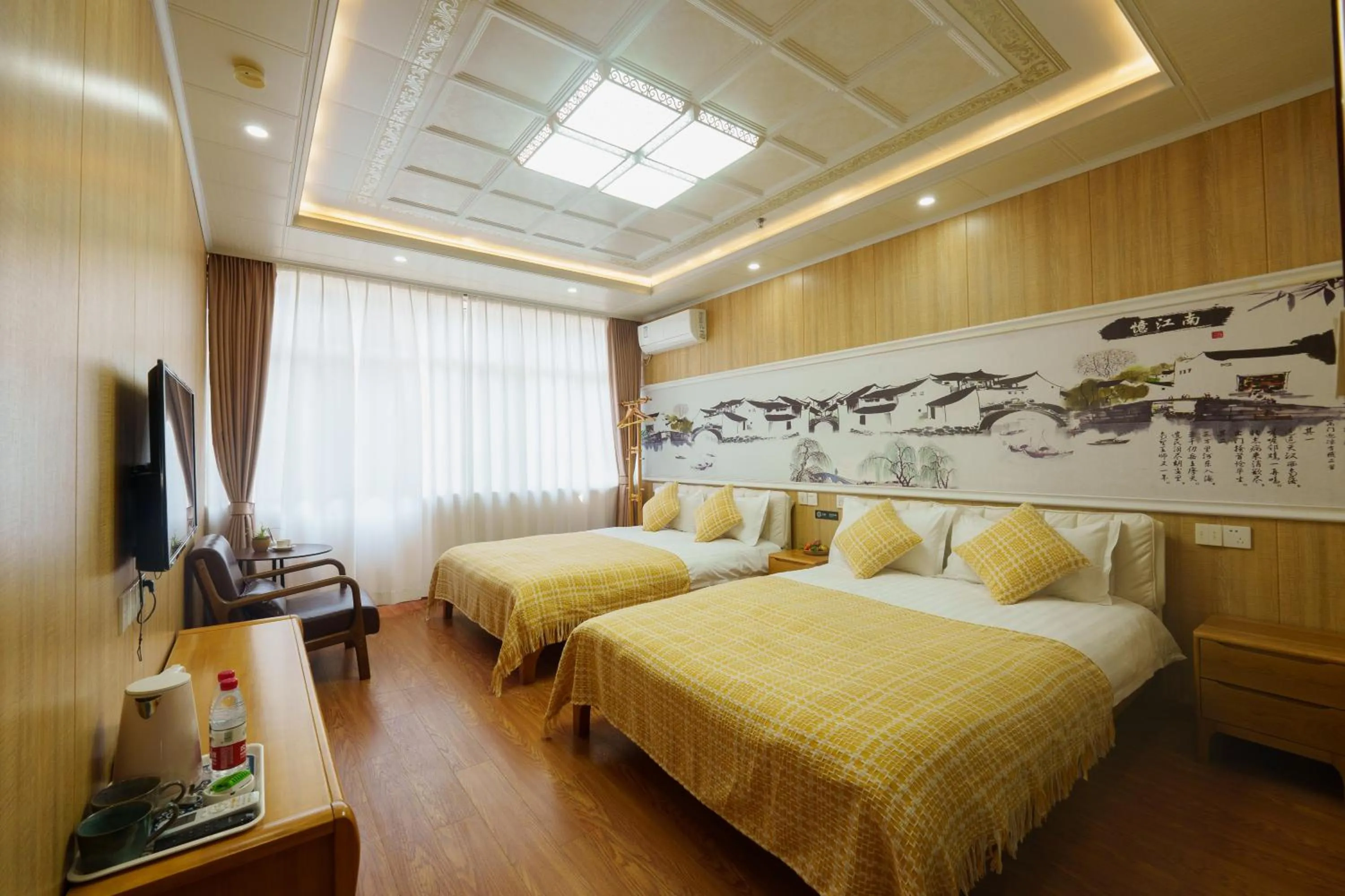 Bed in Floral Yilanxuan Zhouzhuang Hotel