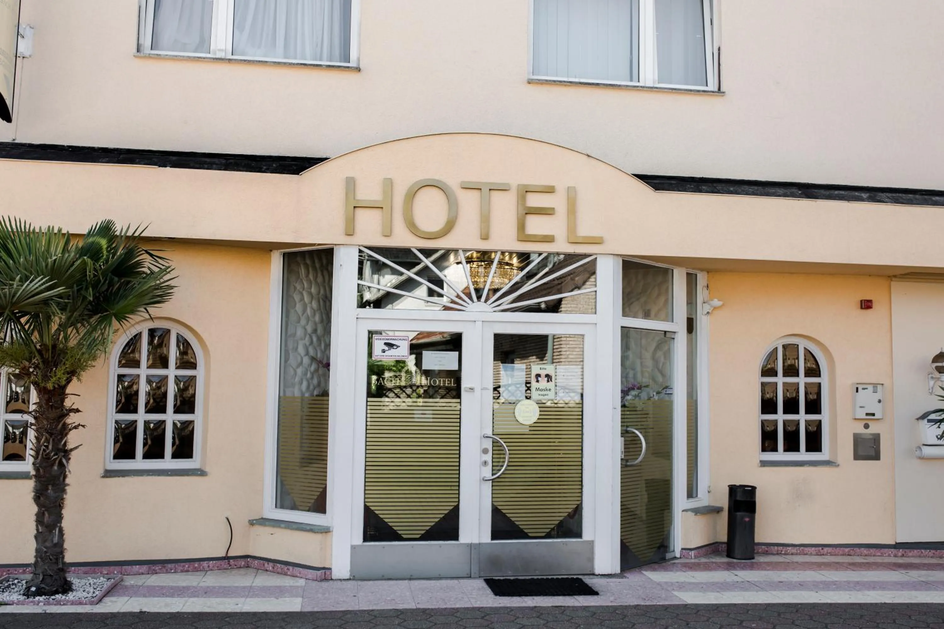 Property logo or sign in Bach Hotel