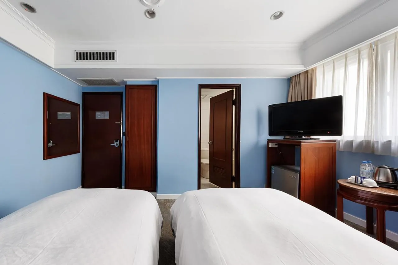 Bed in Moonlight Hotel