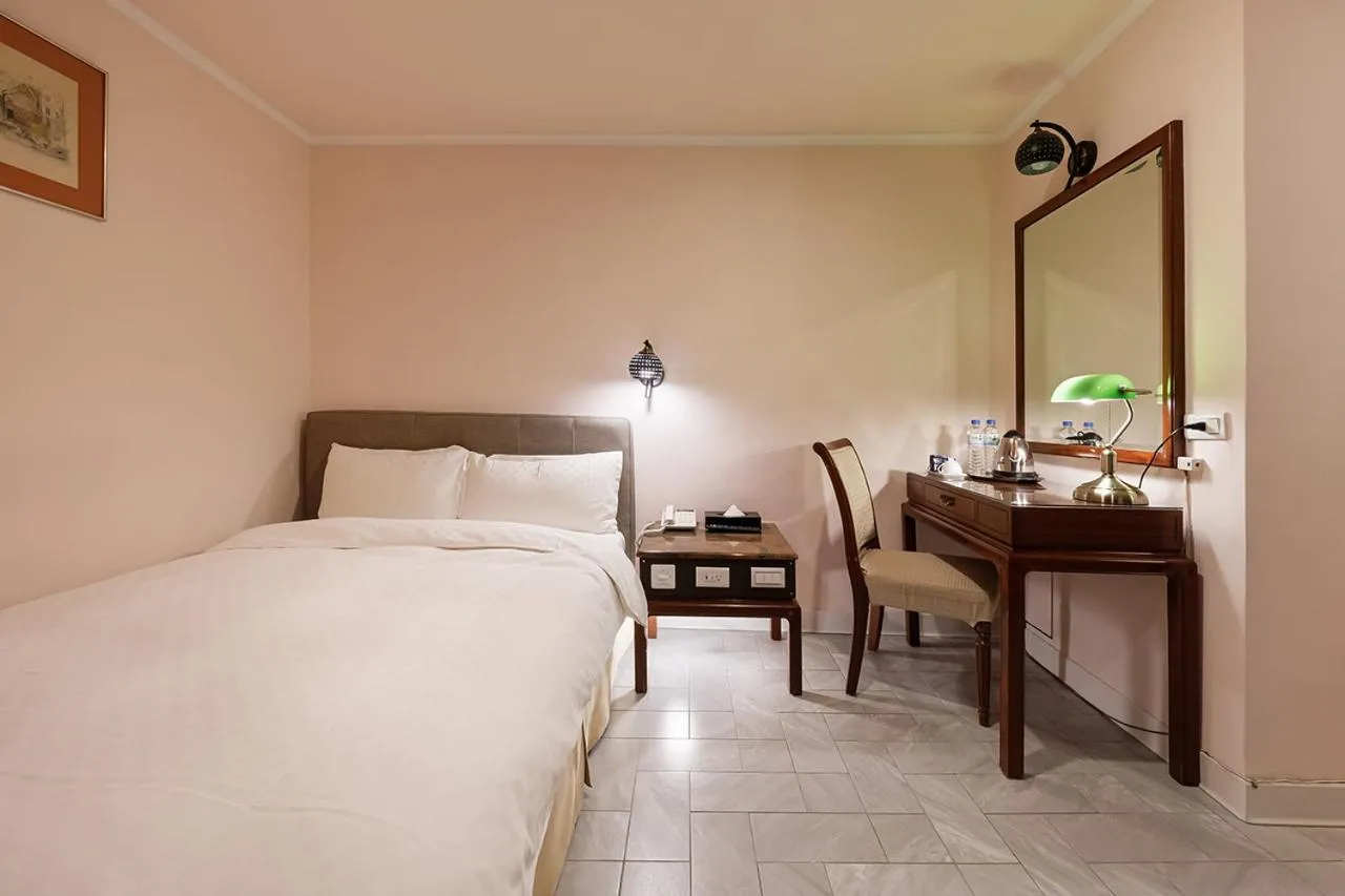 Bed in Moonlight Hotel