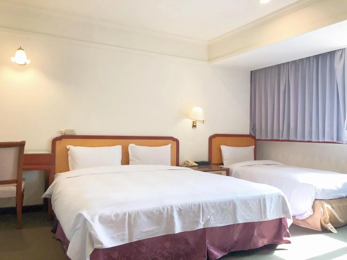 Bed in Moonlight Hotel