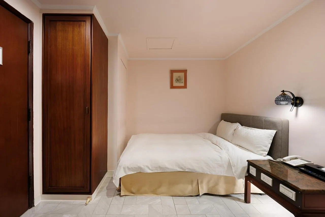 Bed in Moonlight Hotel