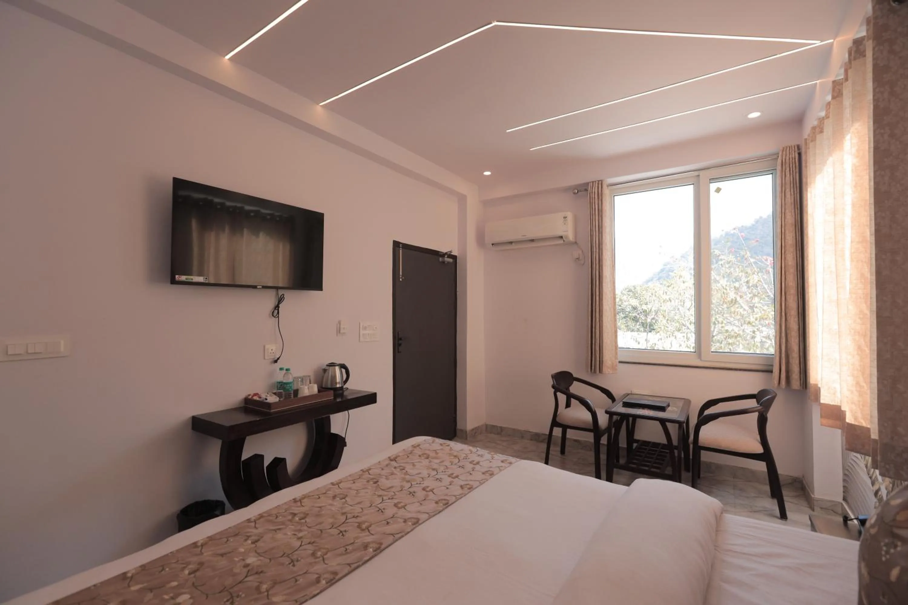 Bed in Yogved Hospitality & Resort