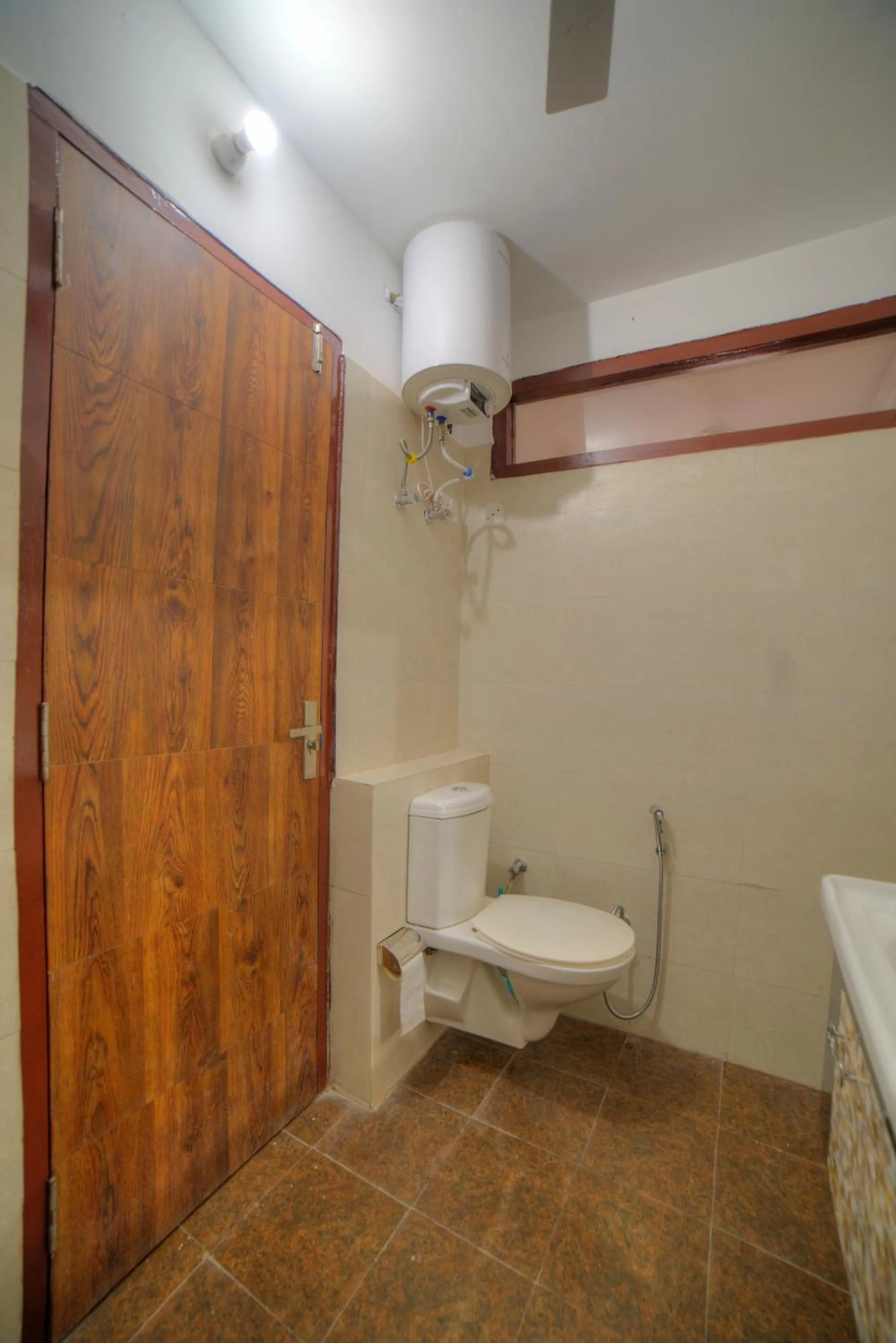 Toilet in Yogved Hospitality & Resort