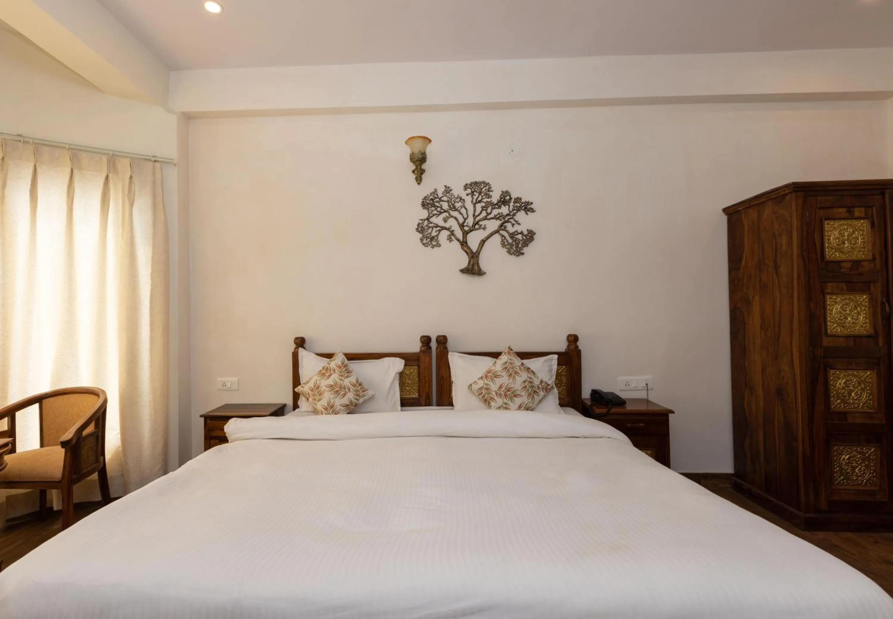 Bed in Yogved Hospitality & Resort