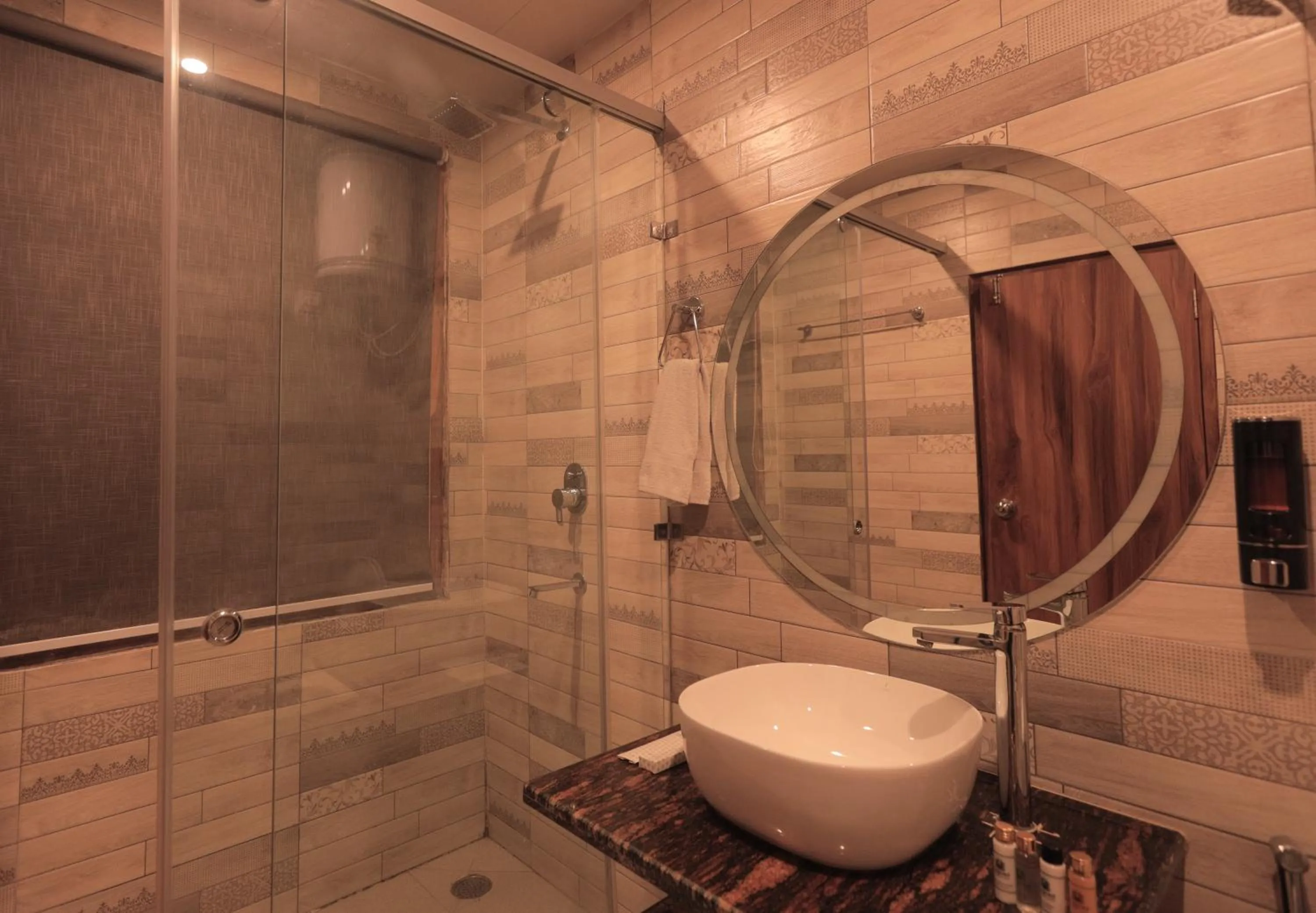 Shower in Yogved Hospitality & Resort